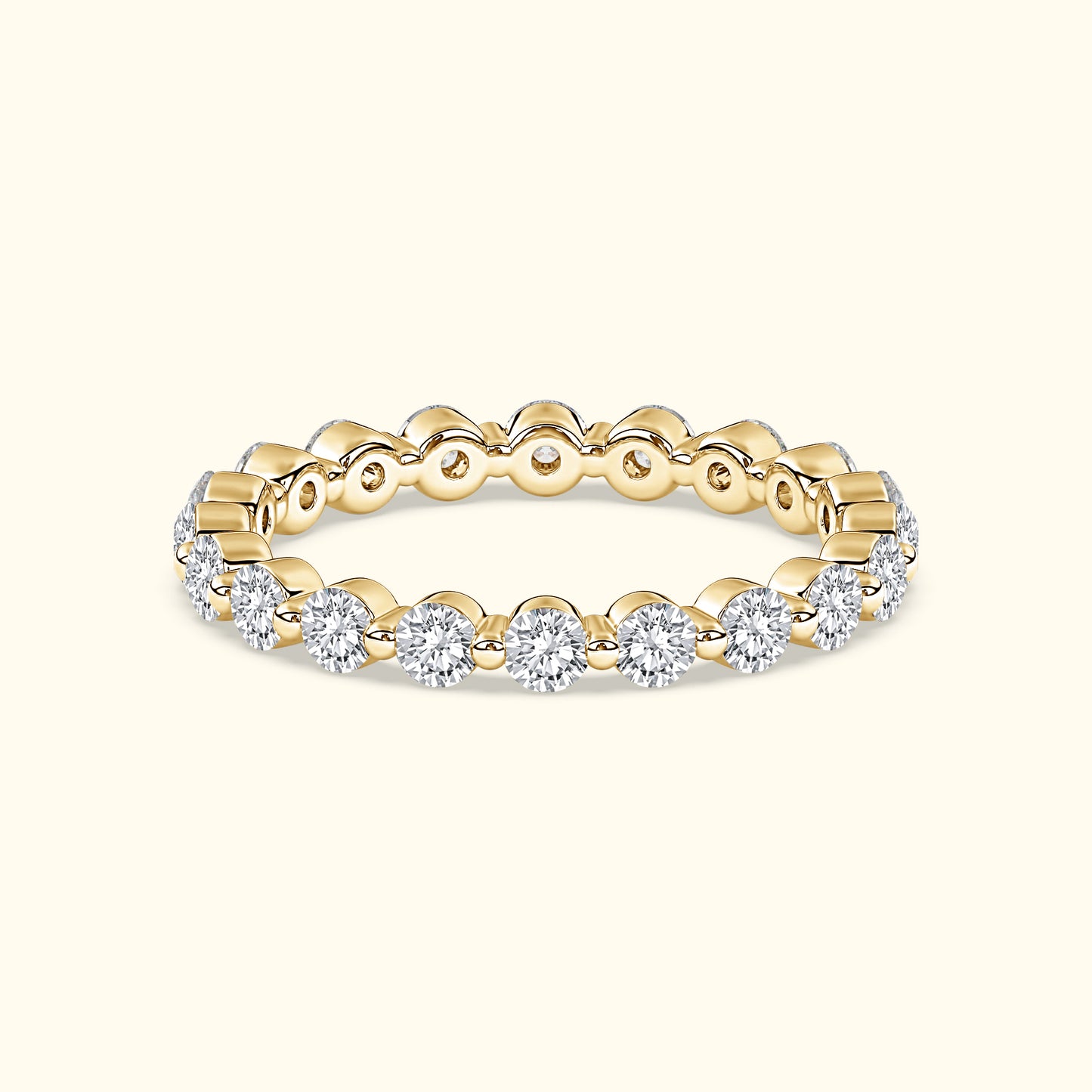 Gold band ring adorned with sparkling round diamonds.
