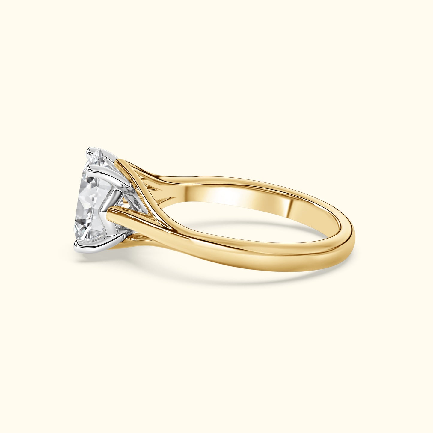 A gold and white gold engagement ring featuring a large, sparkling diamond.