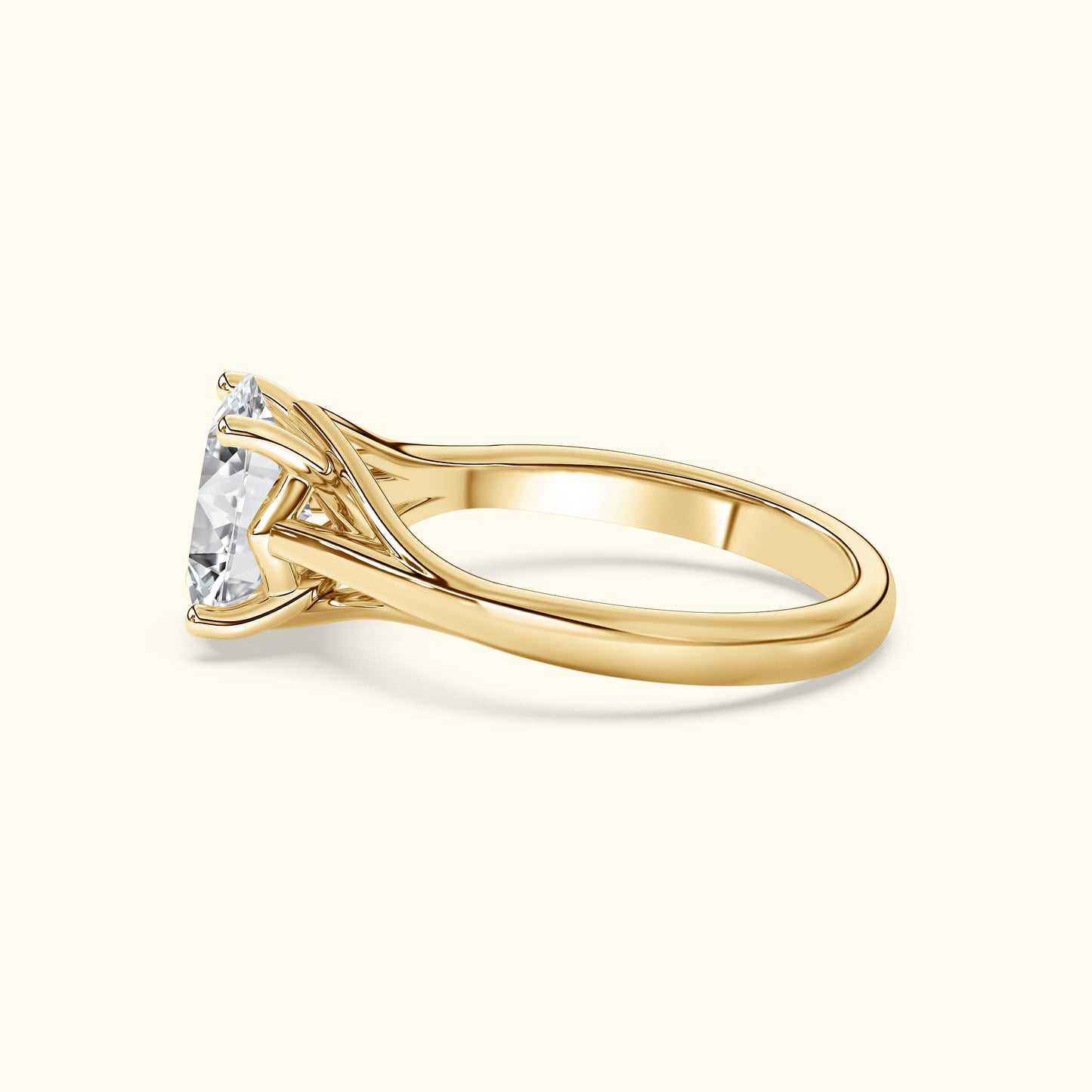Gold engagement ring with a large, sparkling diamond and elegant prong setting.