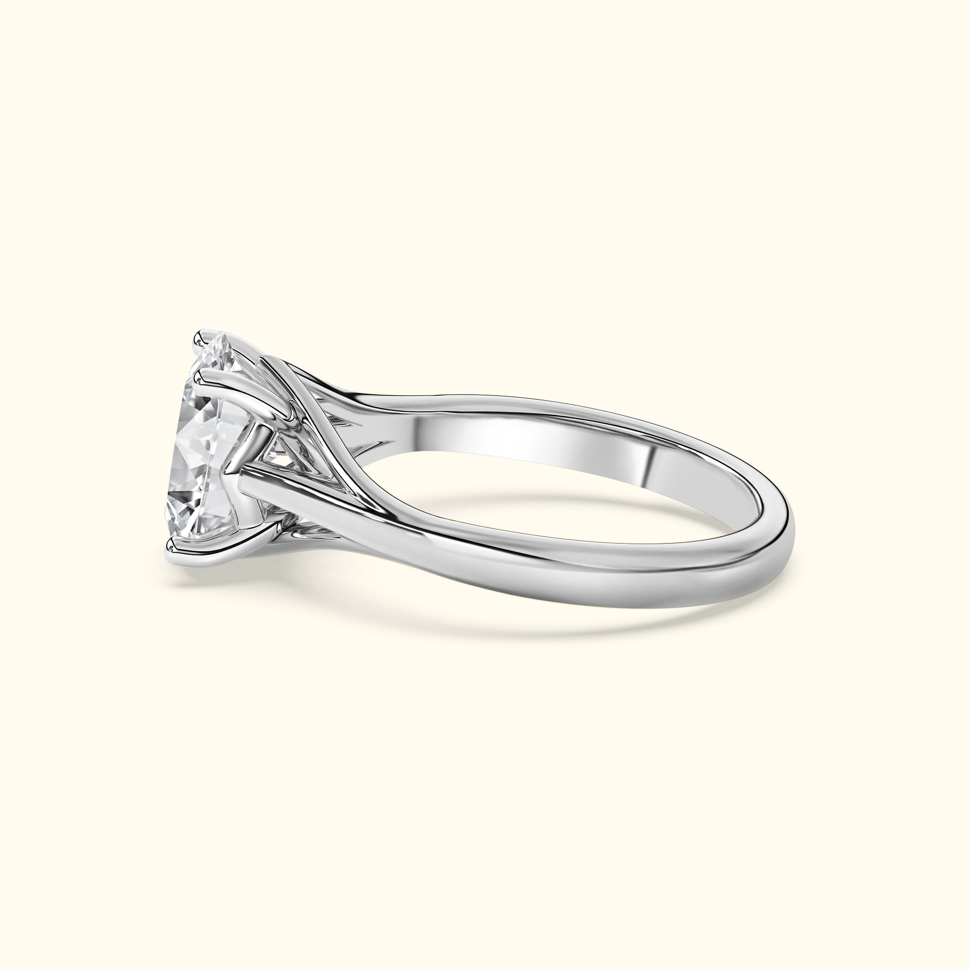 Elegant silver engagement ring with a large, sparkling center diamond.