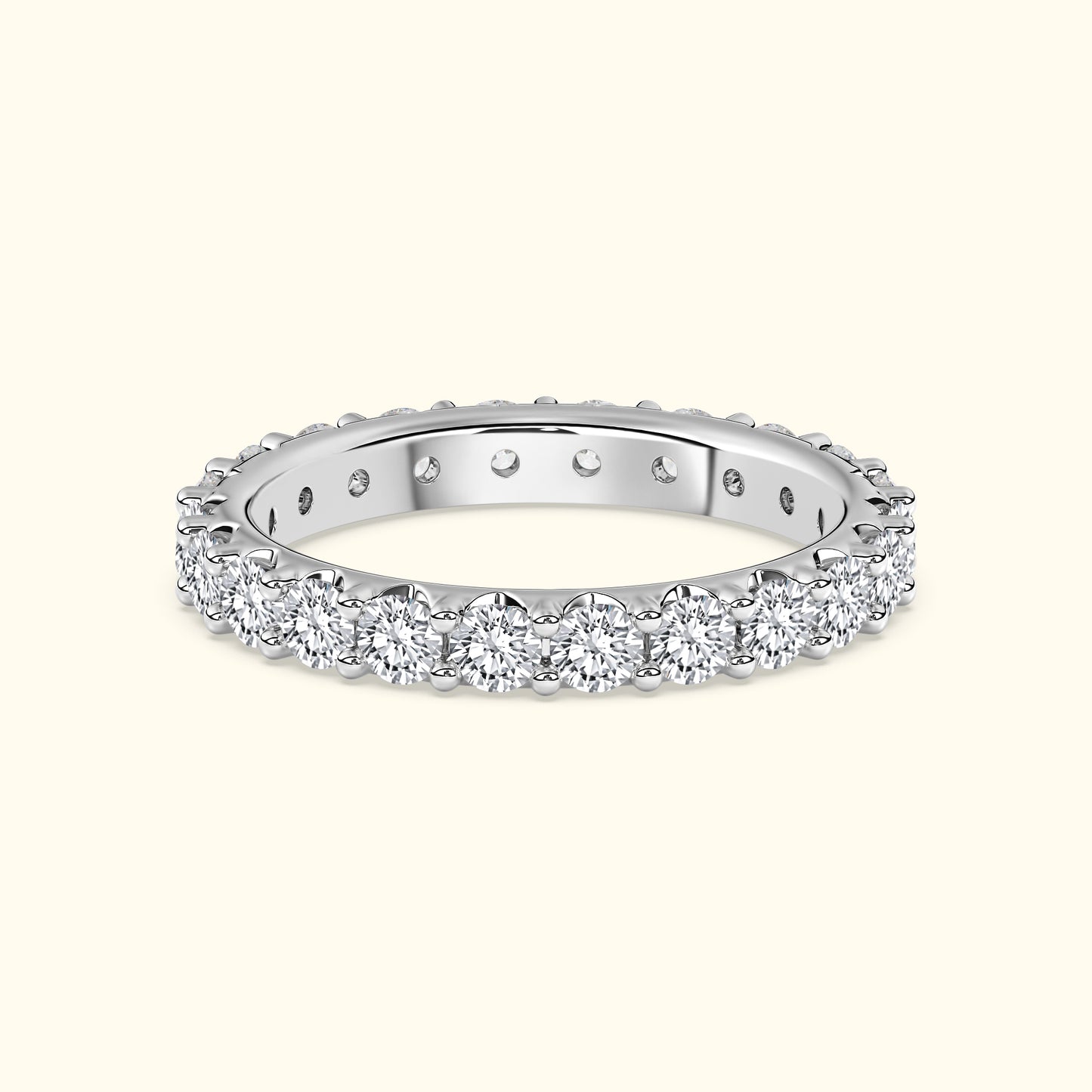 Diamond-accented silver band with a scalloped edge.