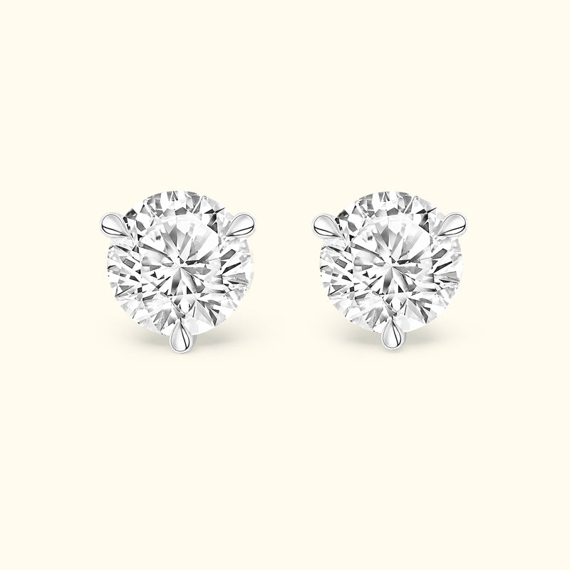 Elegant diamond stud earrings with a classic four-prong setting.