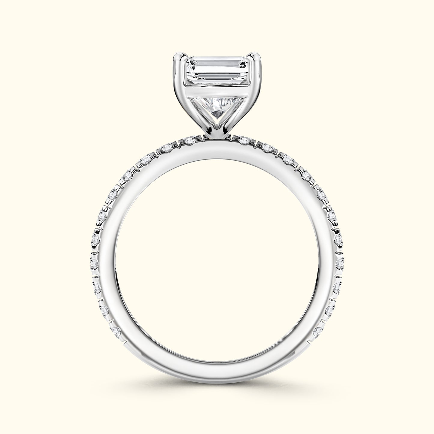 Elegant silver engagement ring featuring a central diamond surrounded by smaller stones.