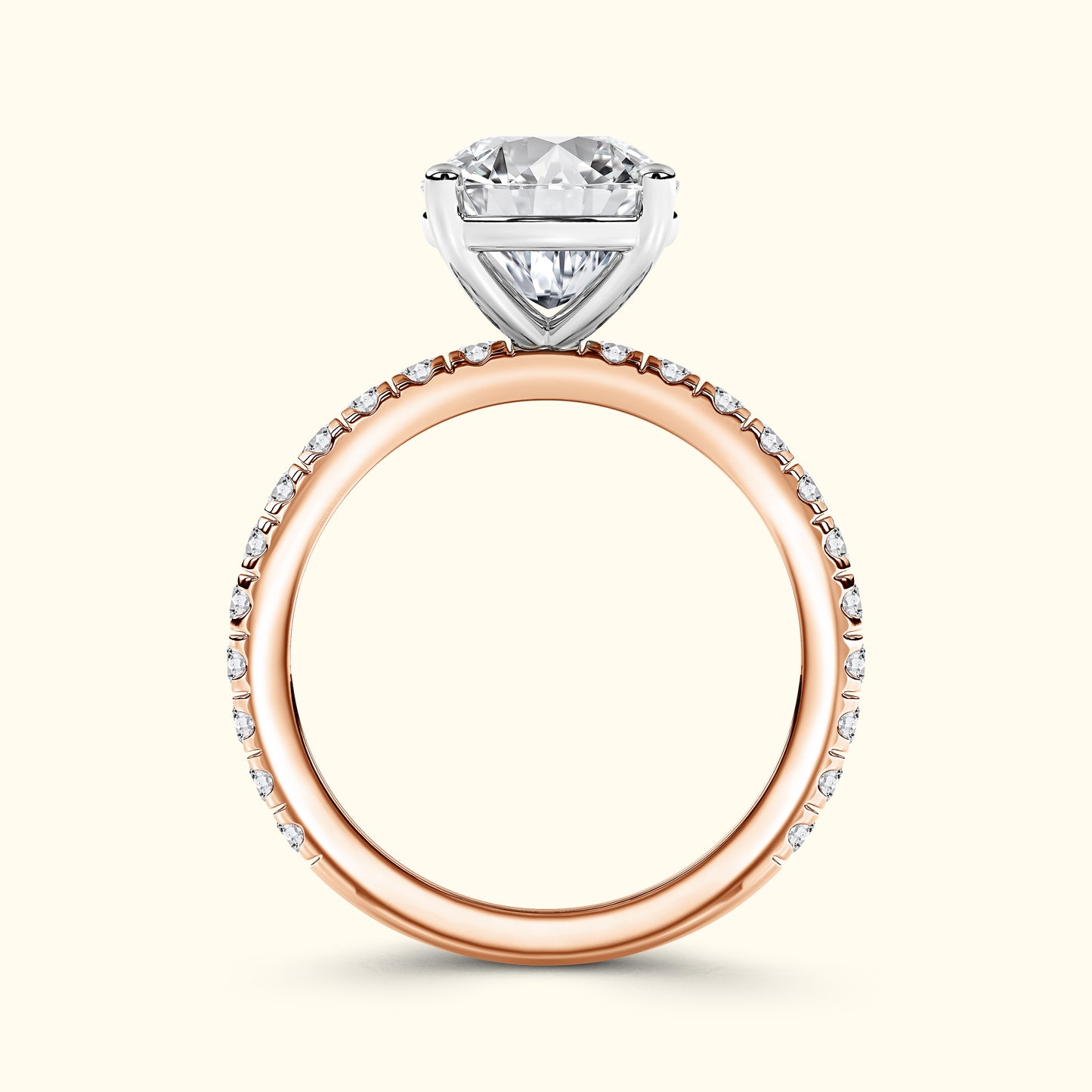 Heart-shaped diamond engagement ring with a rose gold band and small accent stones.