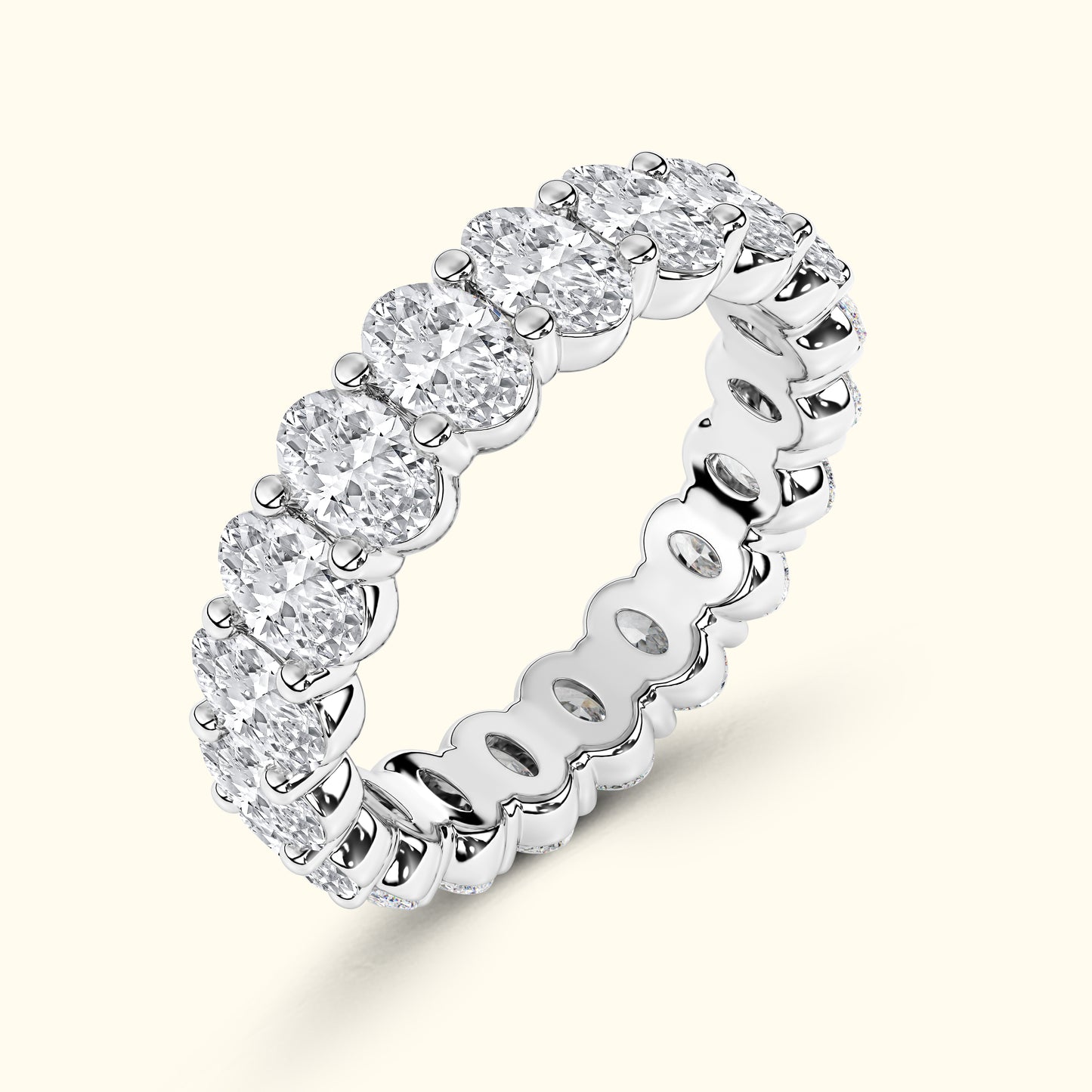A sparkling diamond band ring set in white gold, featuring evenly spaced round diamonds.
