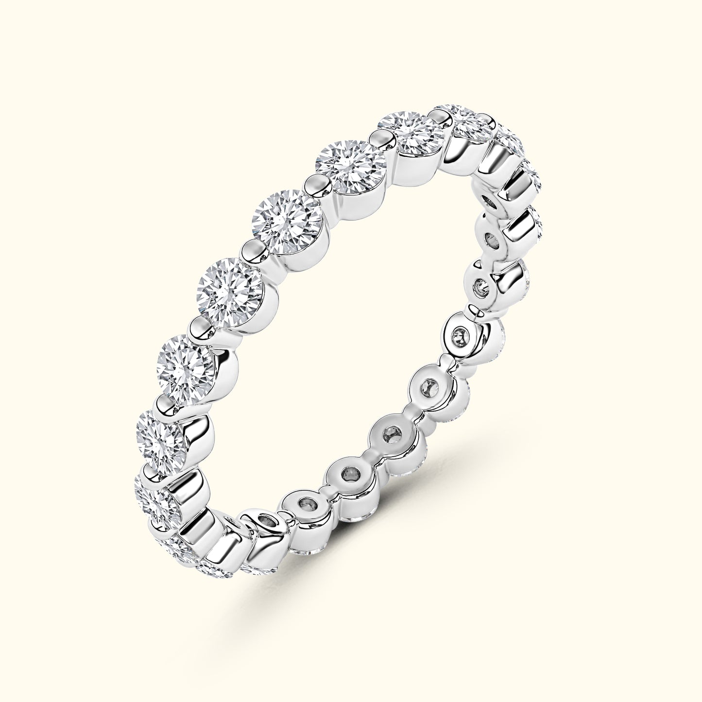 Diamond-studded silver band with a circular design.