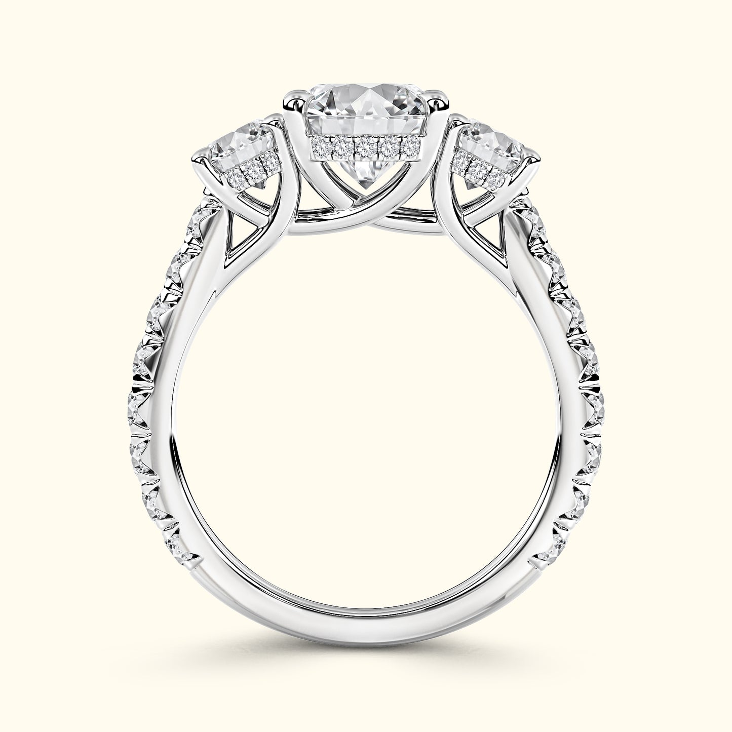 Elegant three-stone engagement ring featuring a central diamond surrounded by smaller diamonds.