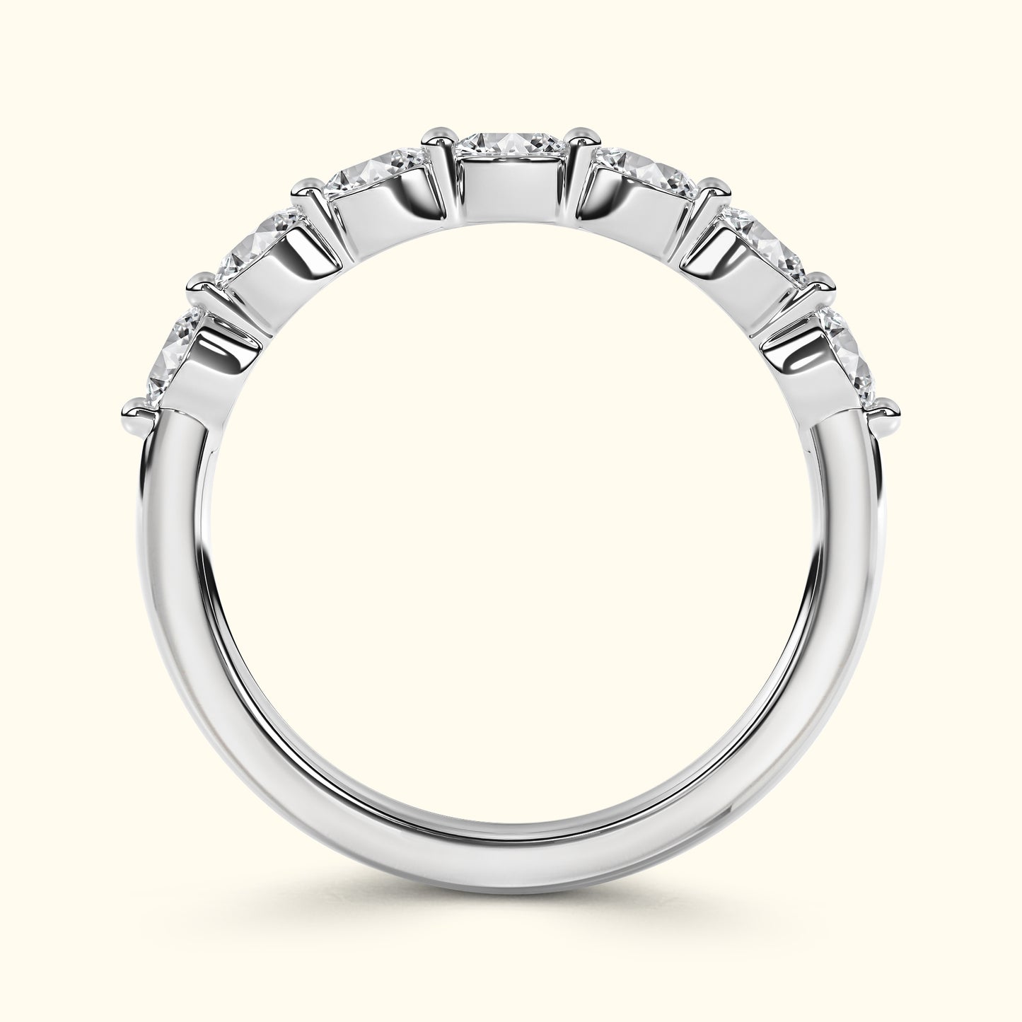 Platinum eternity band with evenly set round diamonds across the top.