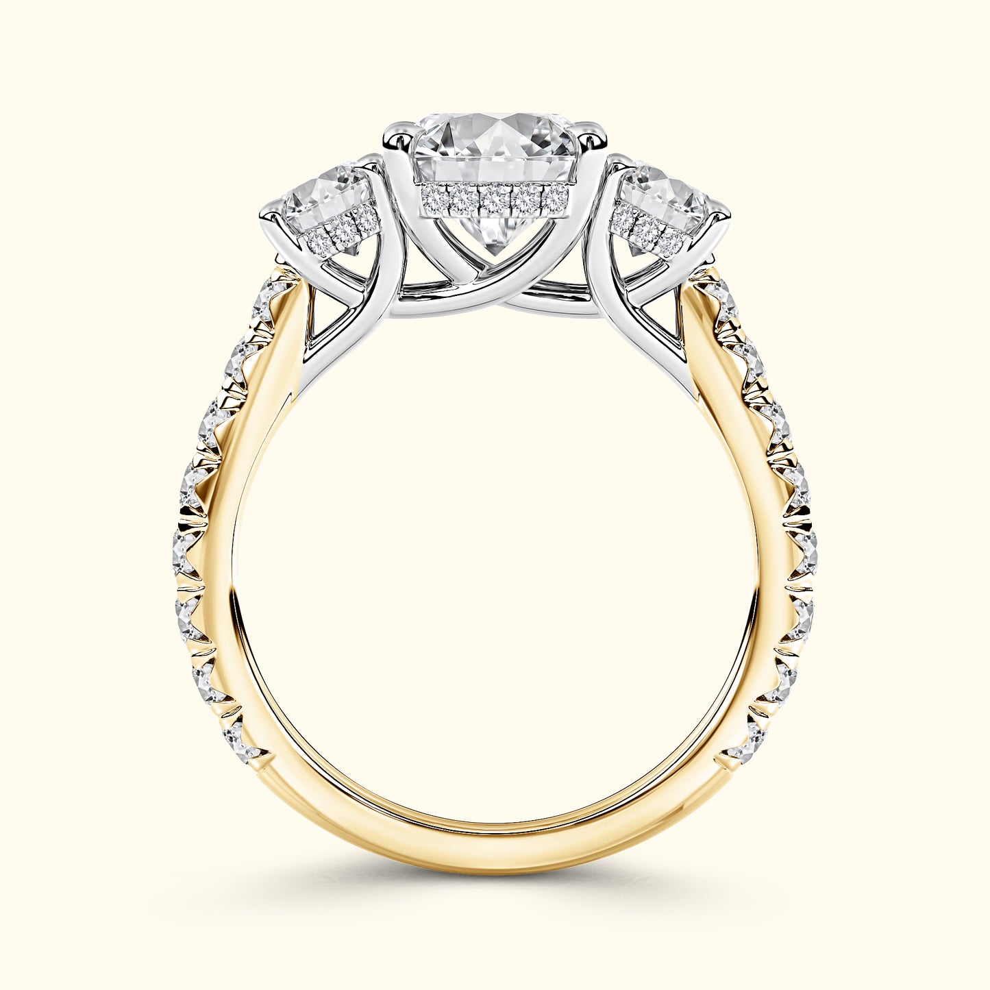 Three-stone engagement ring featuring a central diamond and two smaller side diamonds.