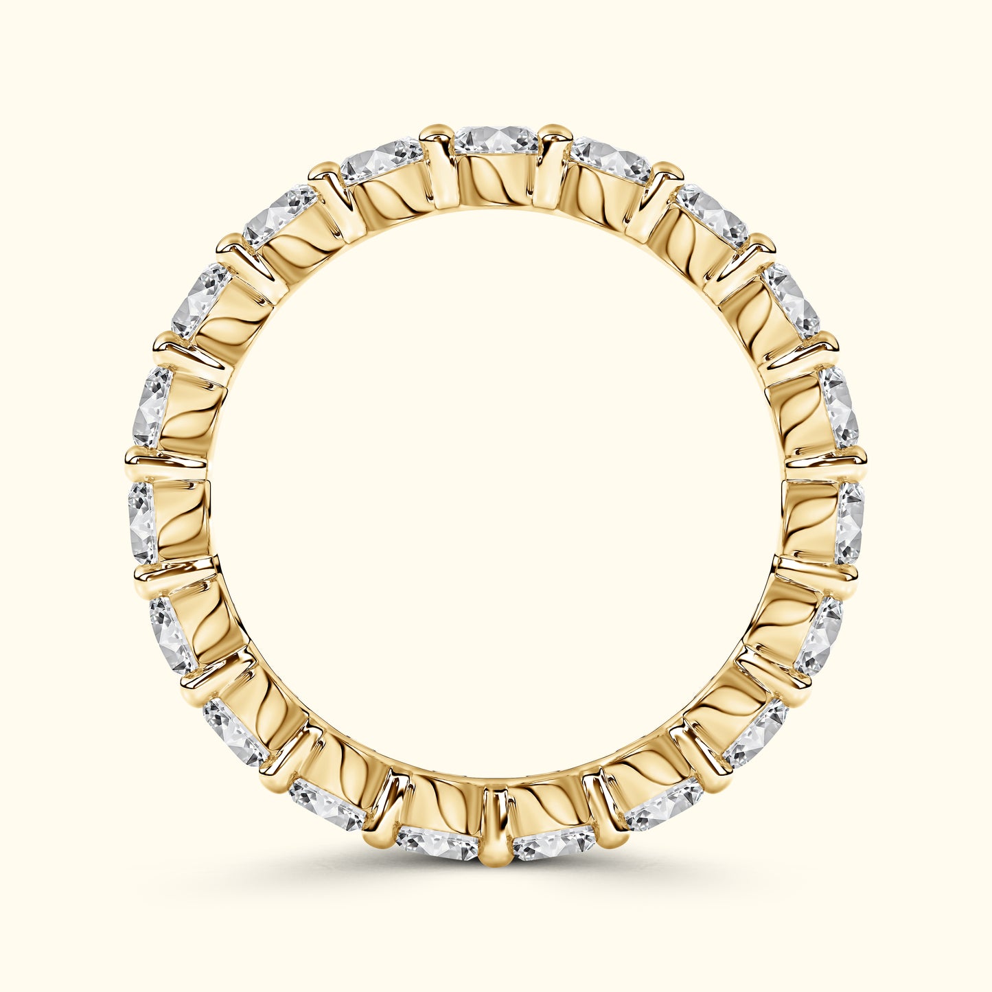 Gold band ring embellished with sparkling clear diamonds around the circumference.