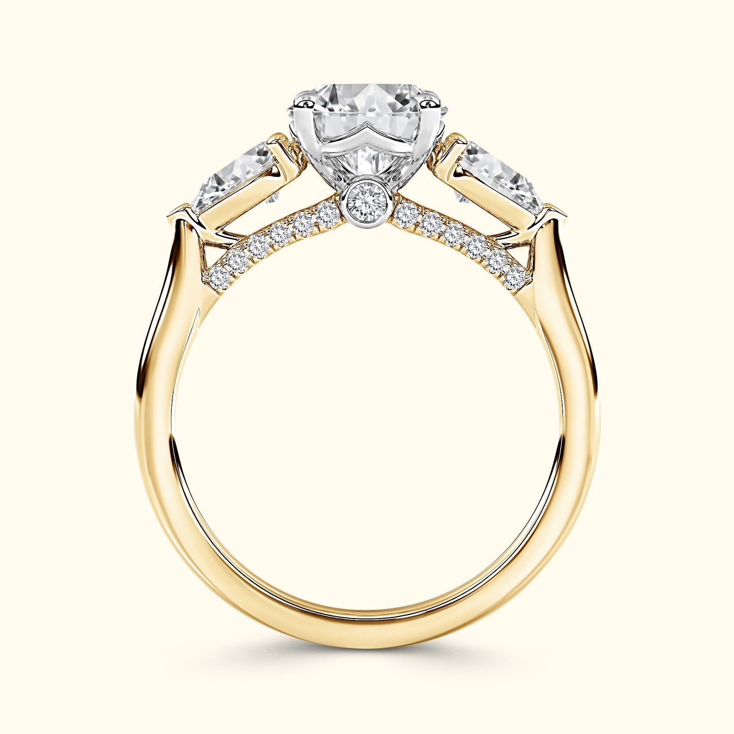 Gold engagement ring featuring a large central diamond and smaller side stones.