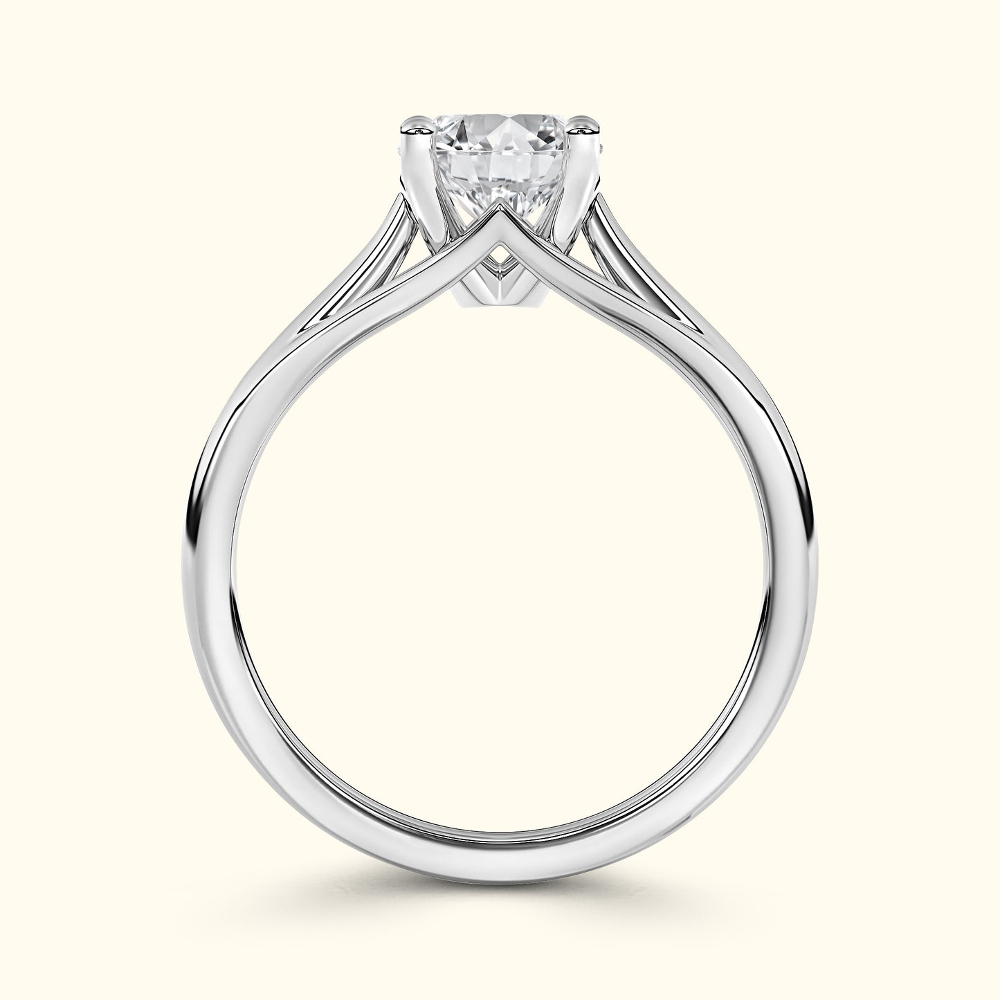 Elegant silver engagement ring with a prominent diamond, featuring a unique split shank design.