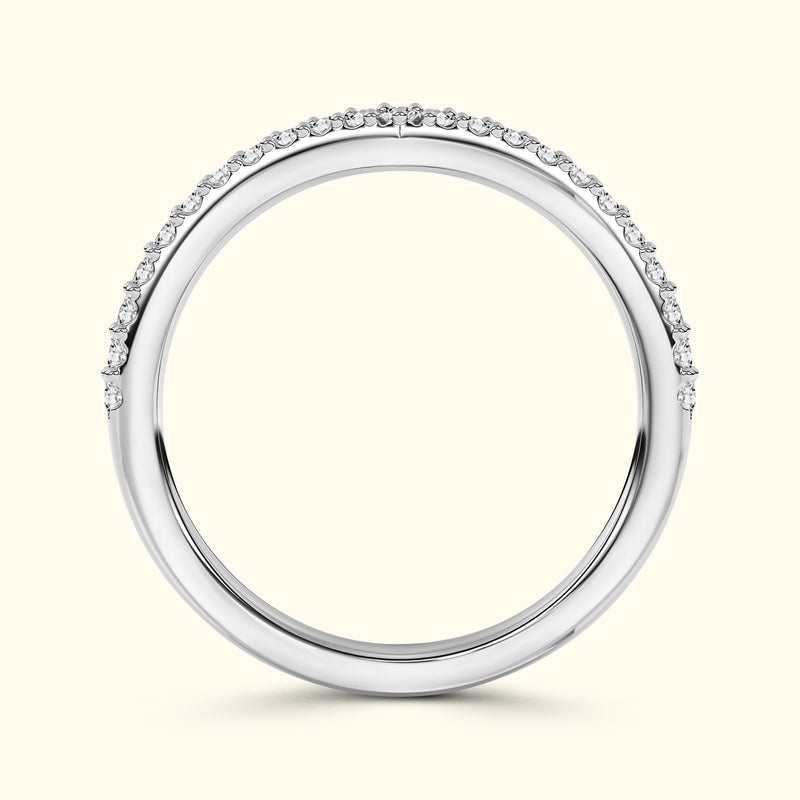 Elegant silver band ring adorned with small sparkling diamonds along the top edge.