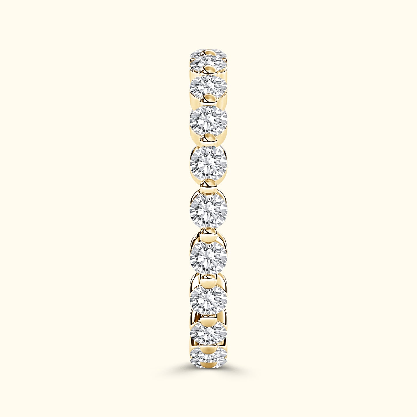 Gold ring featuring a row of sparkling round diamonds set in a sleek design.