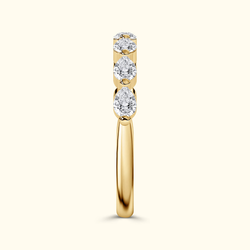 Elegant gold ring featuring three sparkling marquise diamonds.