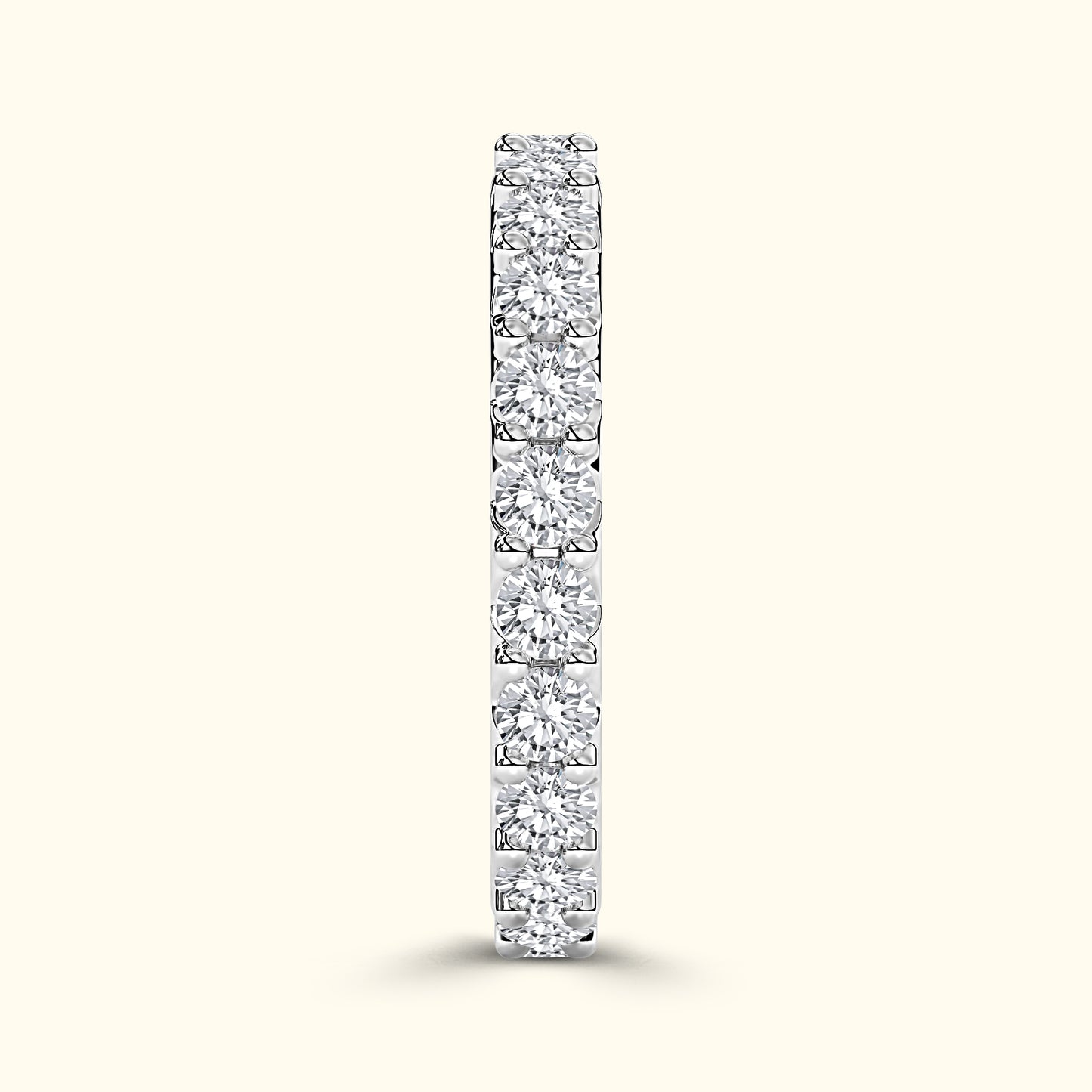 A slim, elegant diamond band featuring multiple round-cut diamonds set in a line.