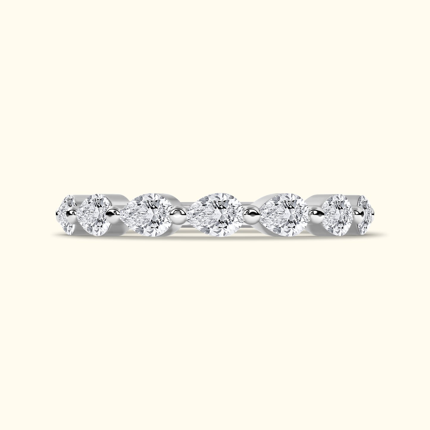 Elegant silver band featuring alternating marquise and round cut diamonds.