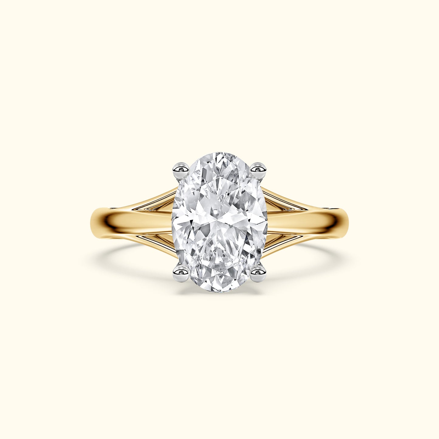 Gold engagement ring with an oval diamond center stone and delicate side detailing.