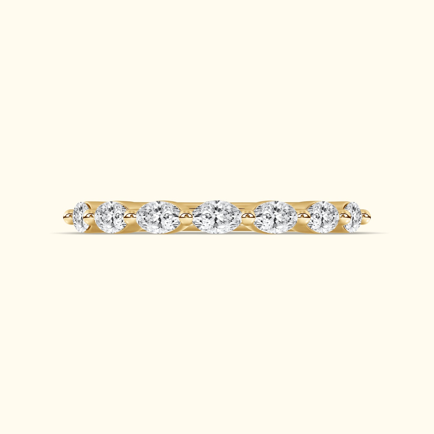 Yellow gold band with alternating round diamonds set in a row.