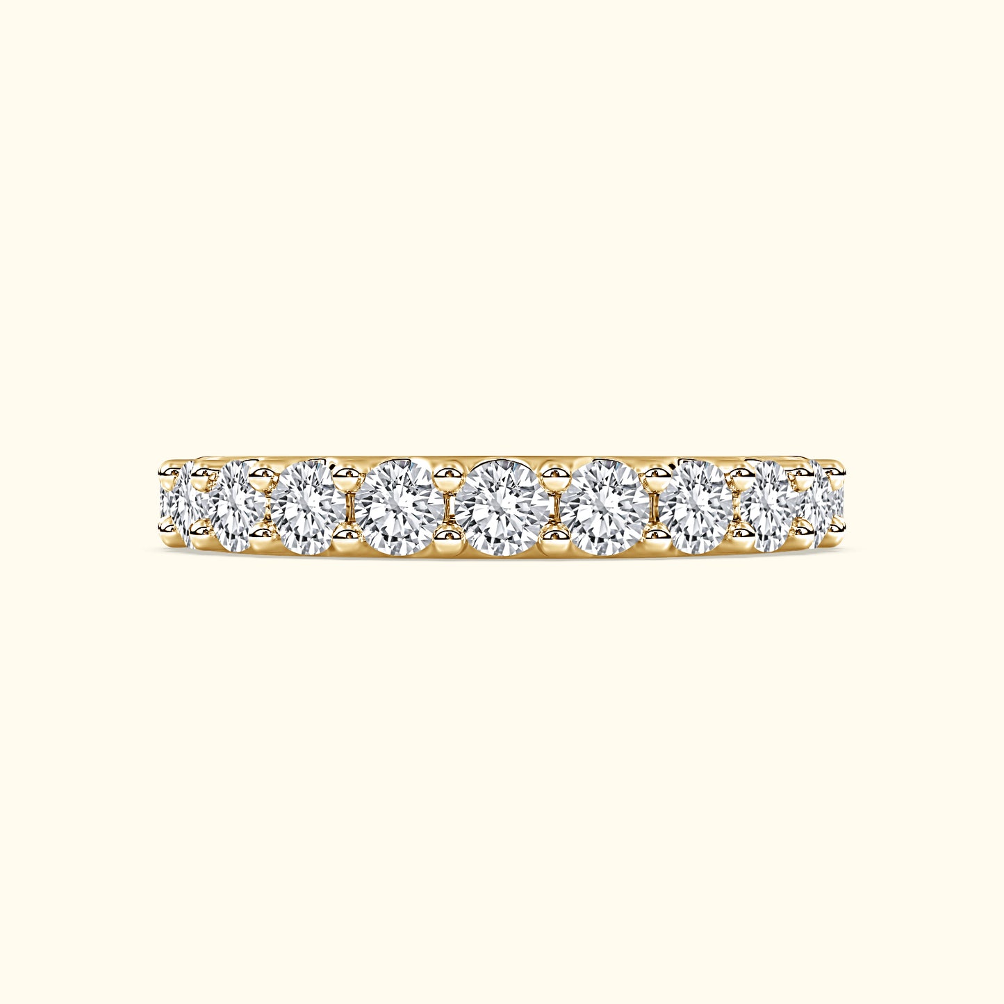 Gold band ring set with multiple round-cut diamonds.