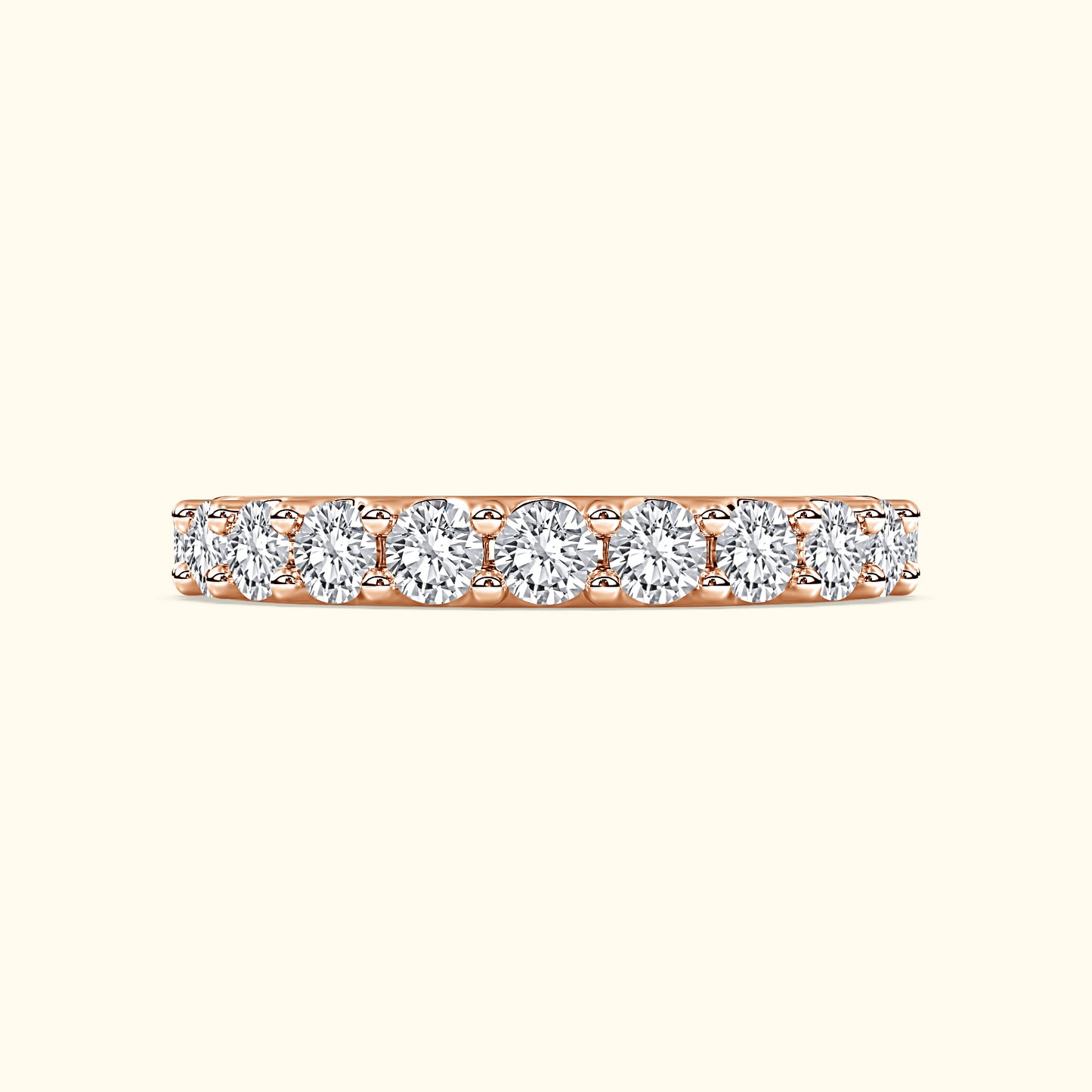 Rose gold band featuring a row of sparkling round diamonds.