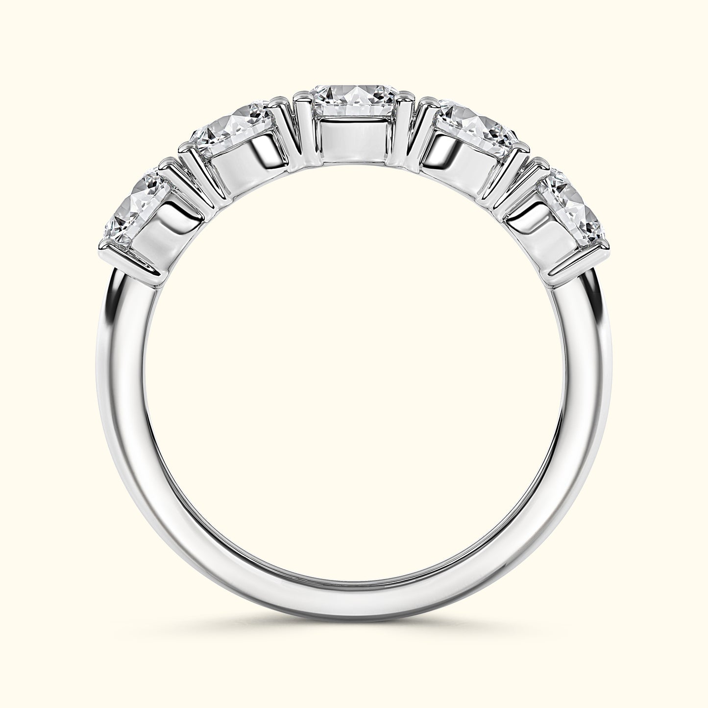 Elegant silver ring with five sparkling diamonds set in a row.