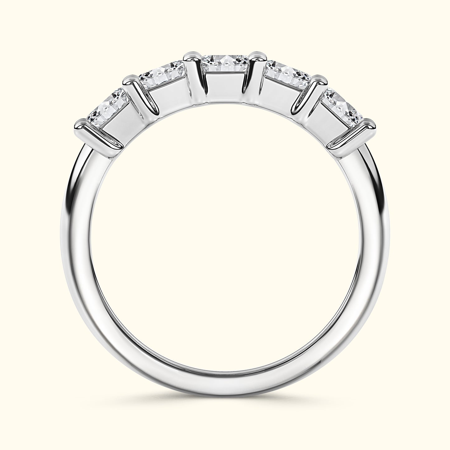 Silver band ring set with five sparkling diamonds.