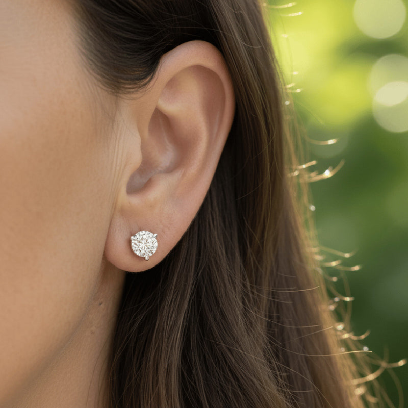 3.00 CTW round lab-grown diamond stud earrings in a signature three-prong martini-style 14kt white gold setting.