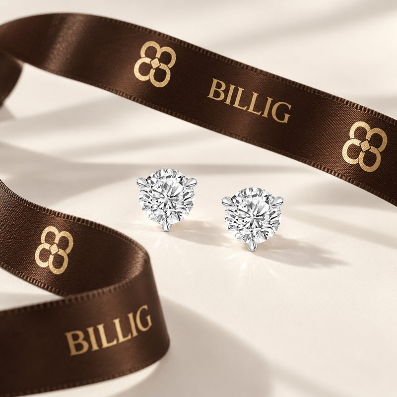 3.00 CTW round lab-grown diamond stud earrings in a signature three-prong martini-style 14kt white gold setting.