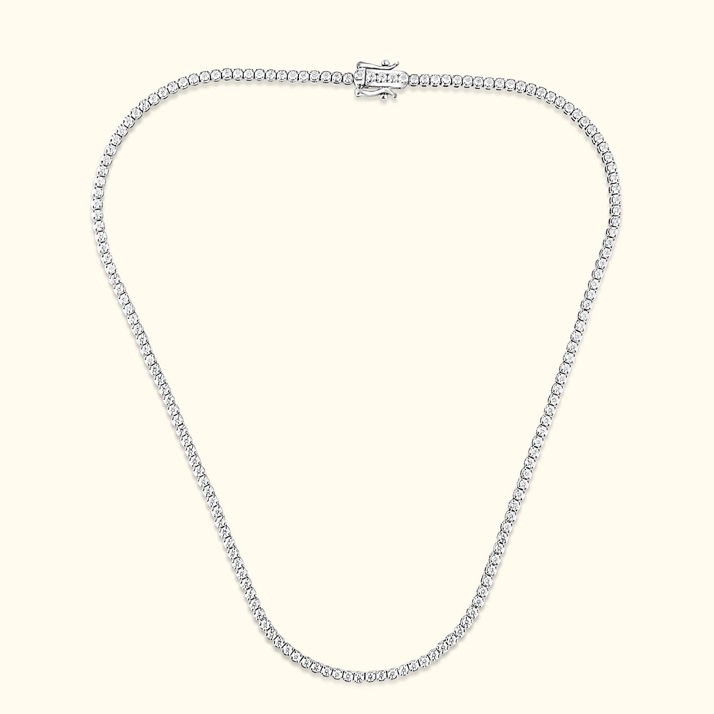 Elegant silver chain necklace adorned with sparkling gemstones, featuring a secure clasp.