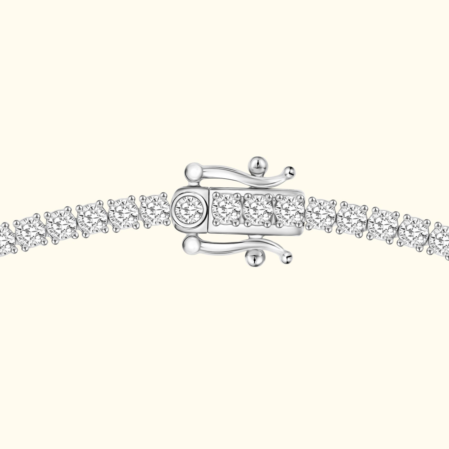 Silver bracelet featuring a line of sparkling diamonds with a secure clasp.