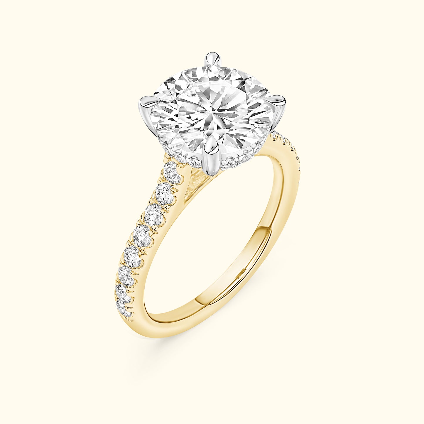 Sparkling diamond engagement ring with a gold band and side diamonds.