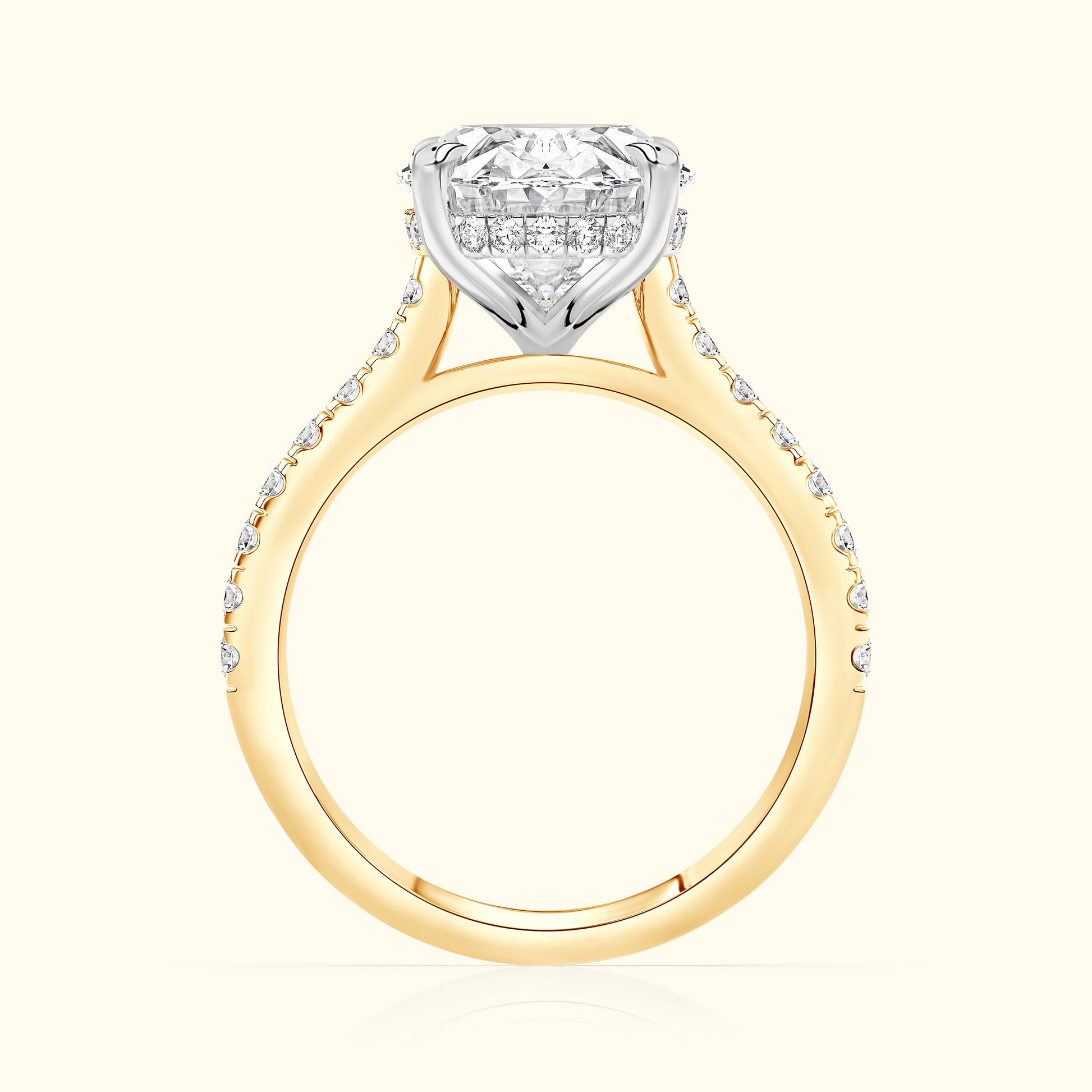 Elegant two-tone engagement ring featuring a large diamond and smaller accents along the band.