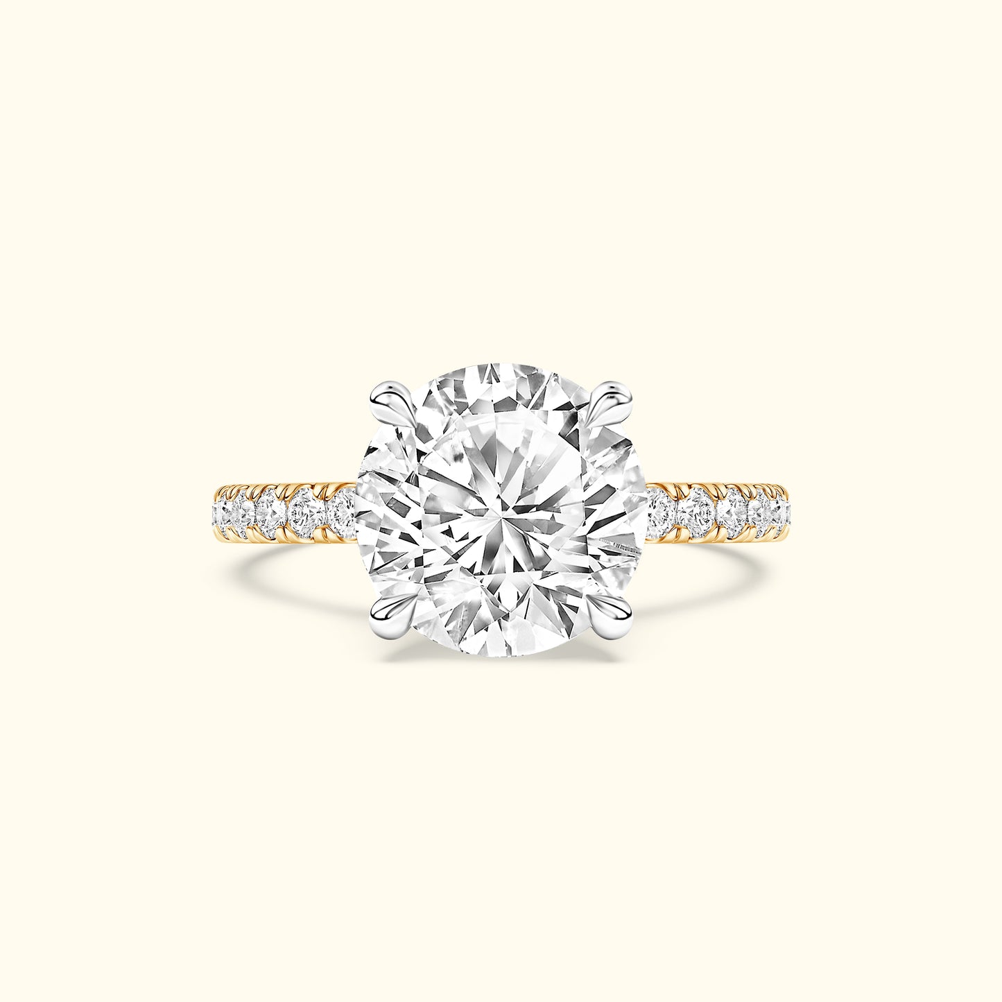 Elegant engagement ring with a large center diamond and a diamond-accented band.