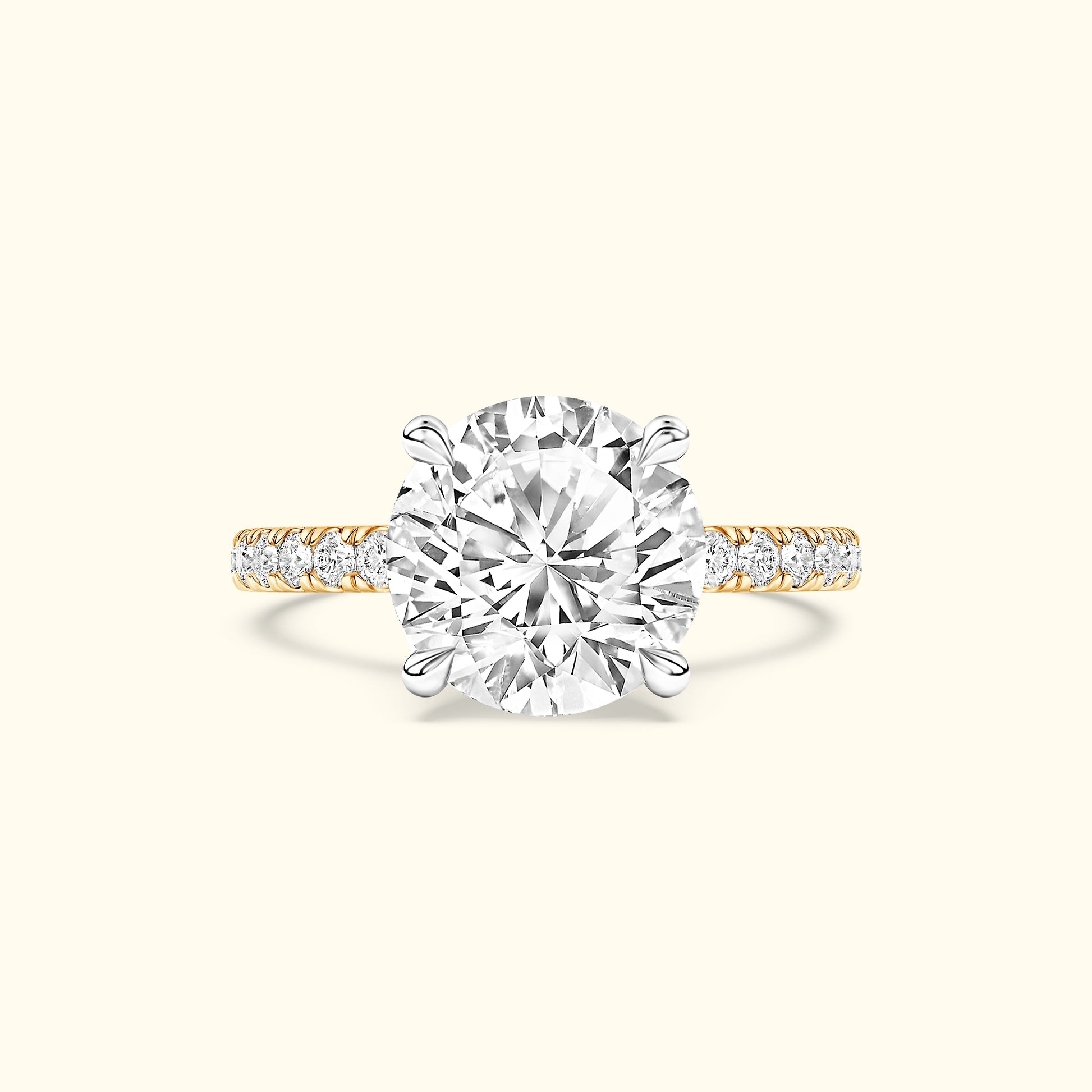Elegant engagement ring with a large center diamond and a diamond-accented band.