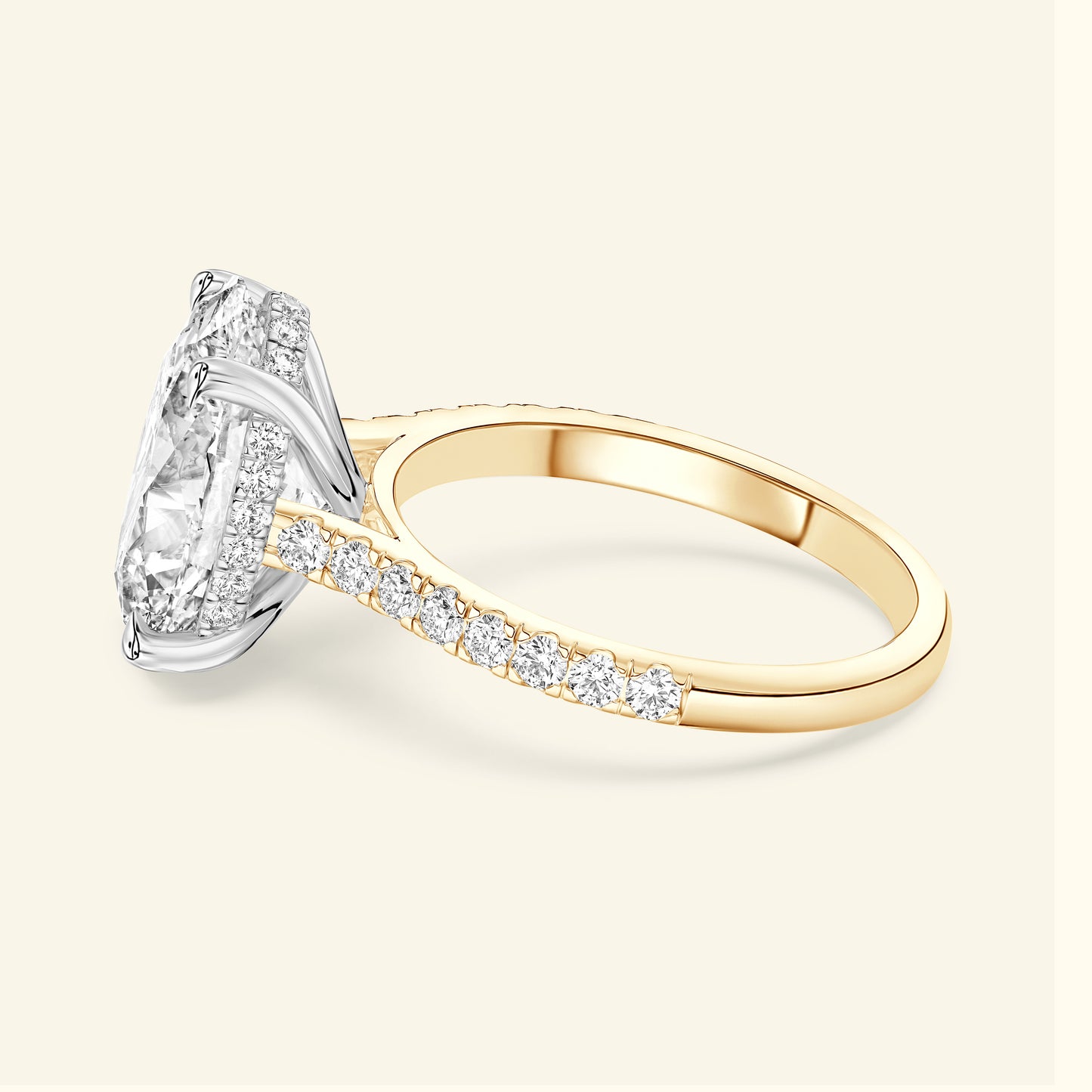 Elegant two-toned engagement ring featuring a large diamond and smaller accent stones.