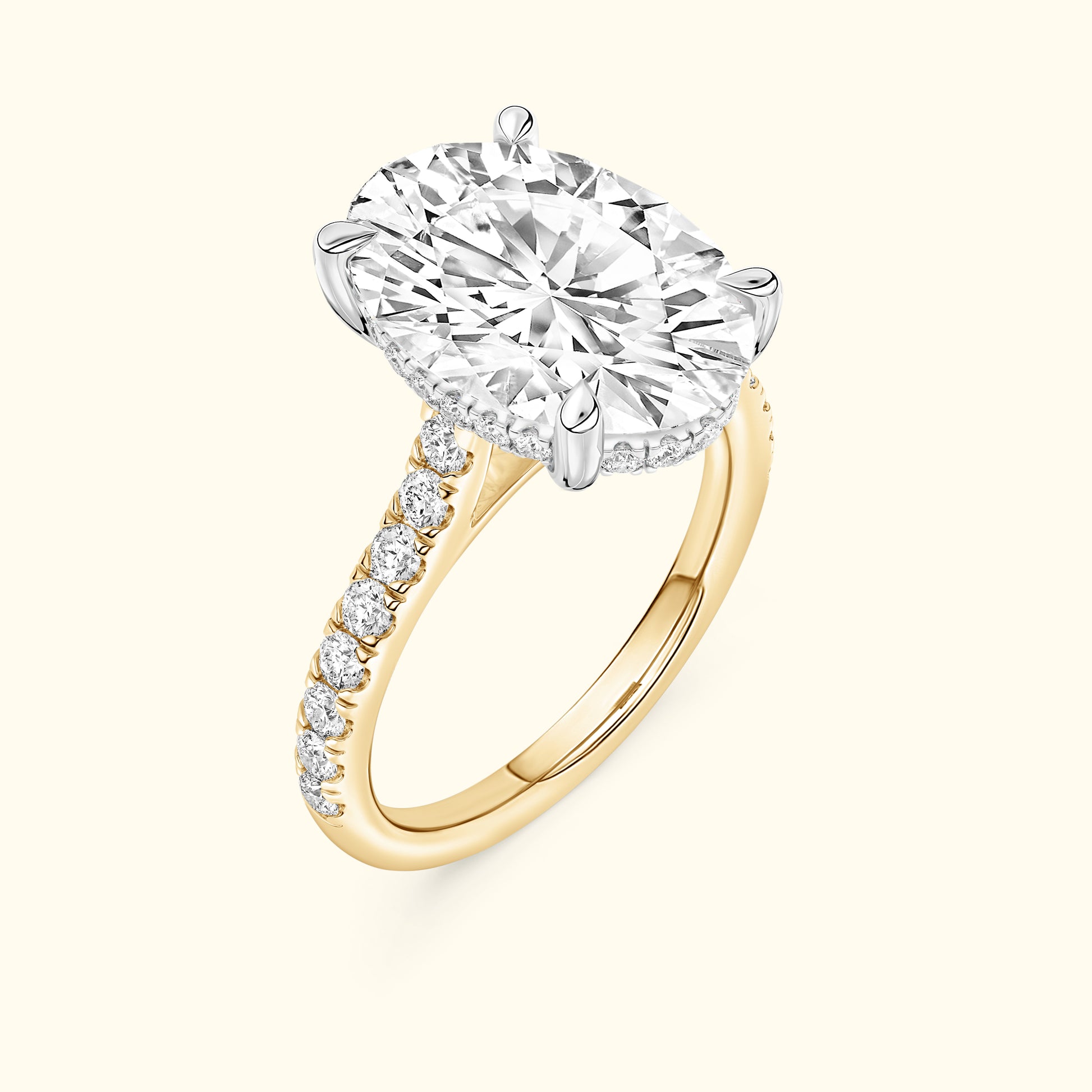 Elegant yellow gold ring featuring a large round diamond centerpiece and smaller side diamonds.