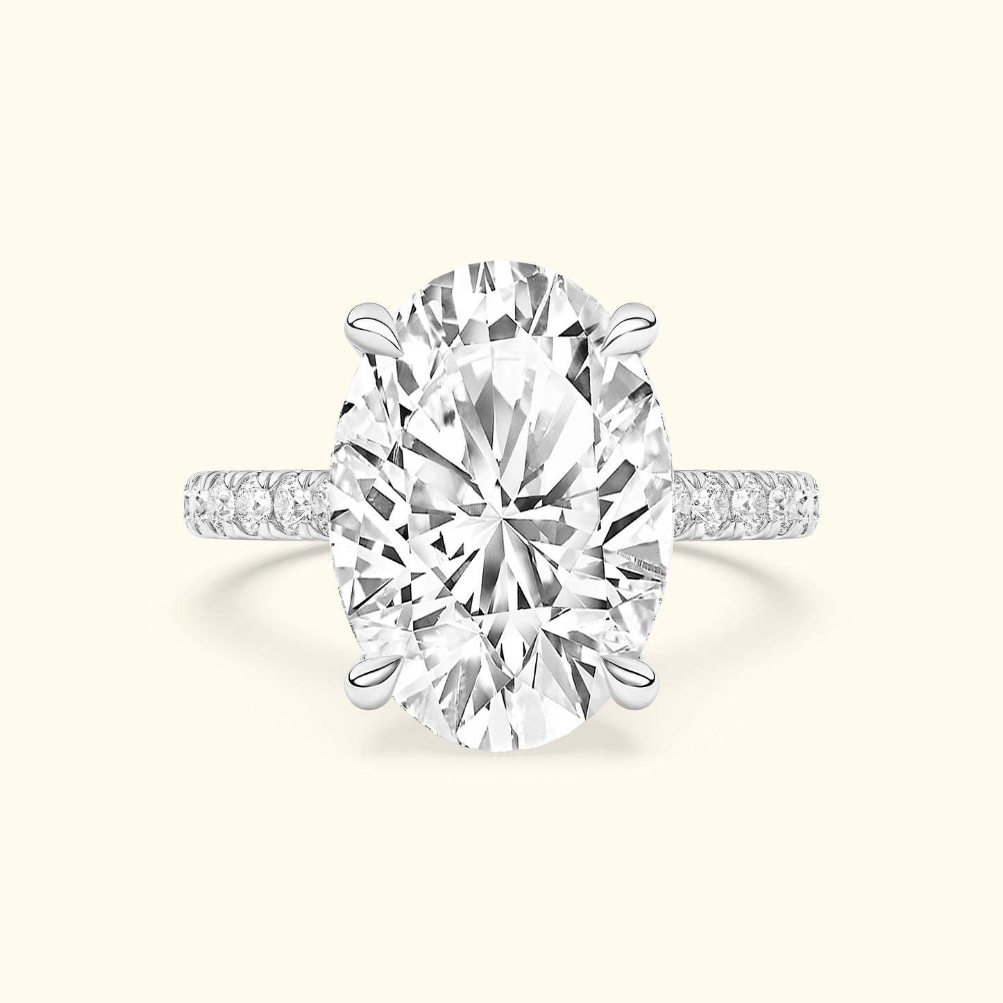 Oval diamond ring with a sparkling band set against a light background.