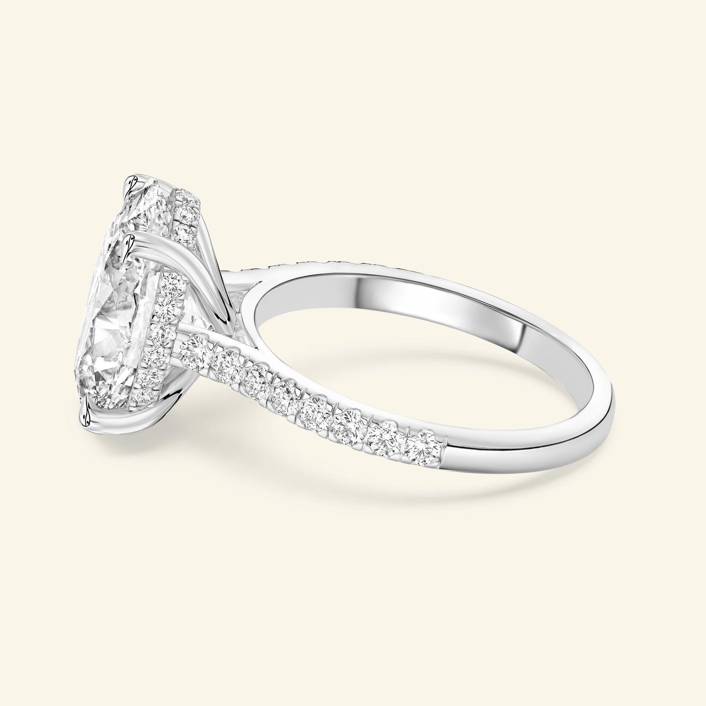 Sparkling diamond engagement ring with a square cut center stone and delicate band.