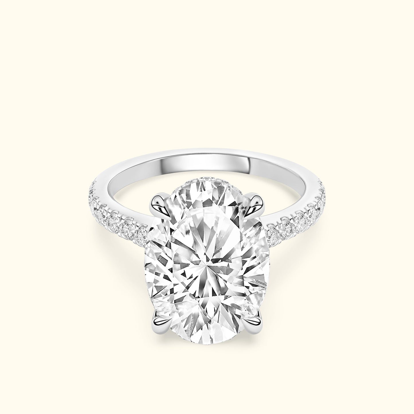 Elegant oval diamond engagement ring with a sparkling pavé band.