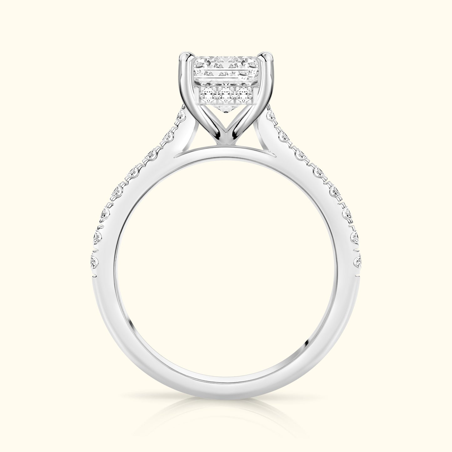 Elegant diamond engagement ring featuring a central cluster and side stones set in white gold.