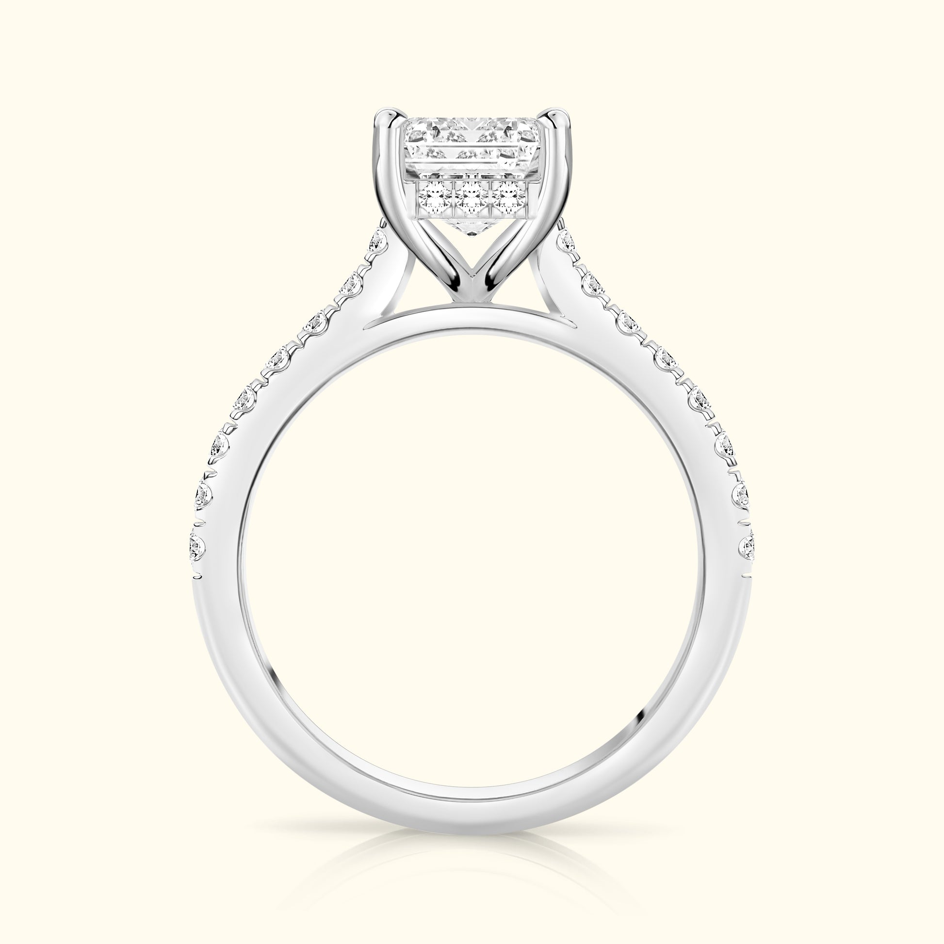 Elegant diamond engagement ring featuring a central cluster and side stones set in white gold.