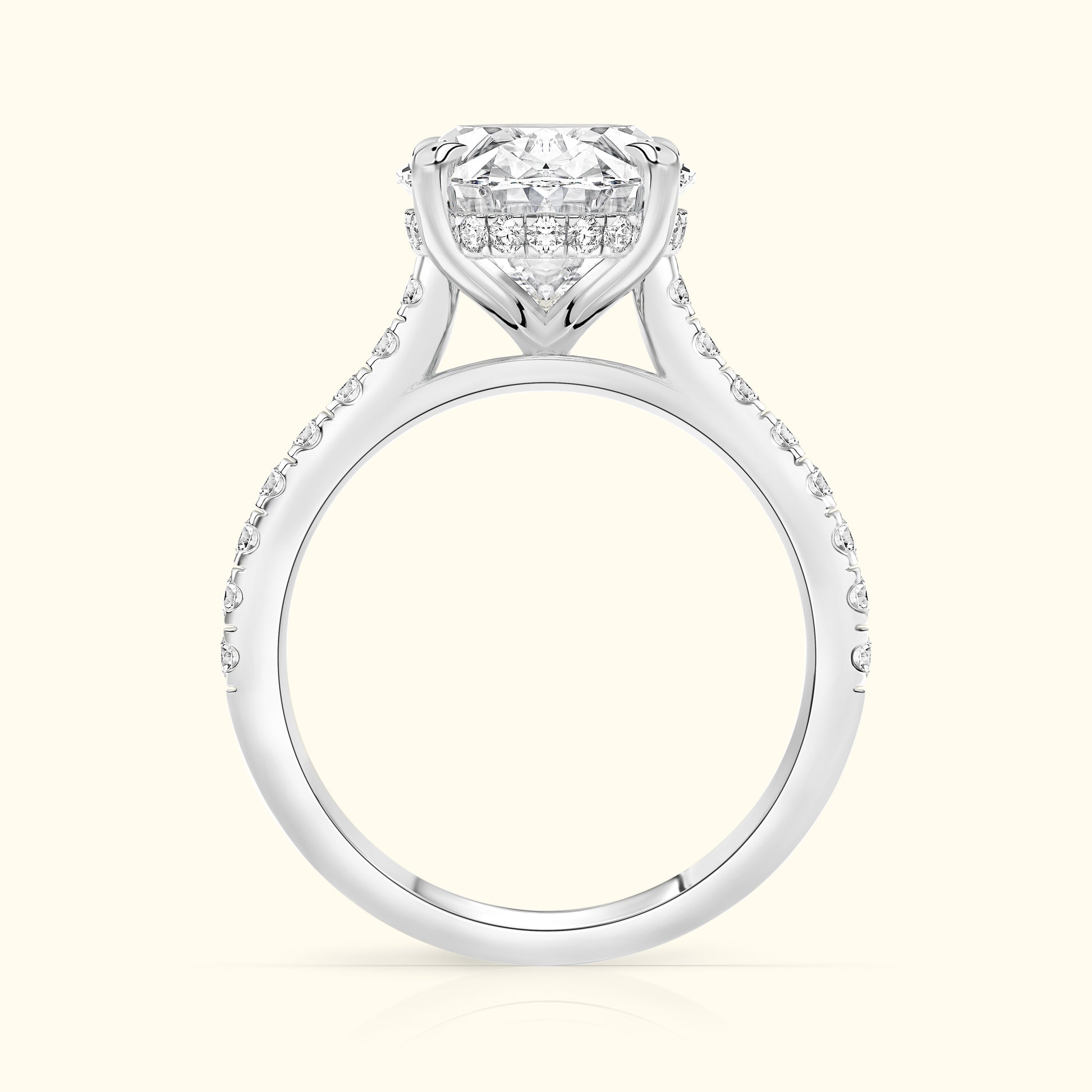Elegant white gold engagement ring with a large diamond and smaller accent stones.