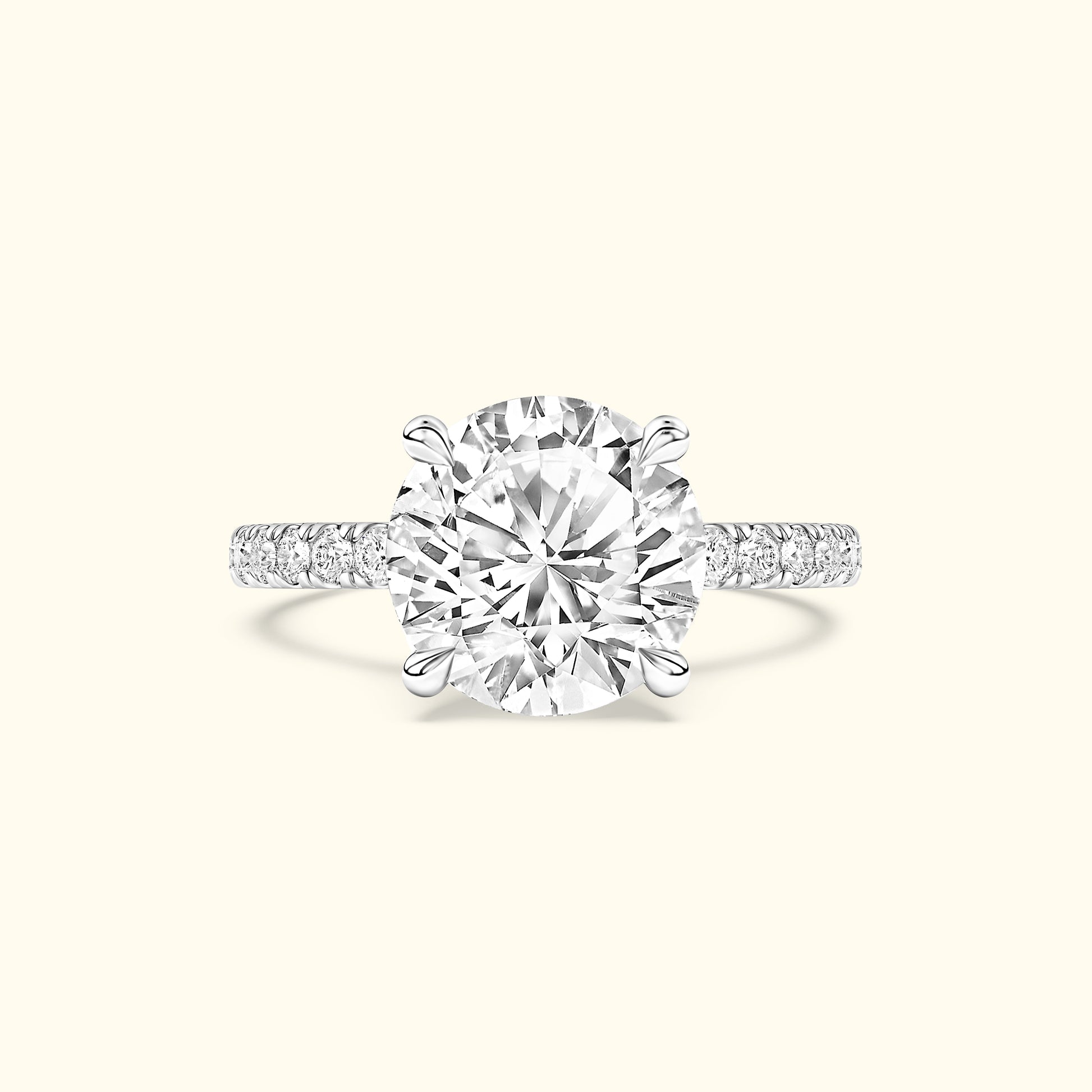 A sparkling diamond engagement ring with a large central stone and smaller accent stones on the band.