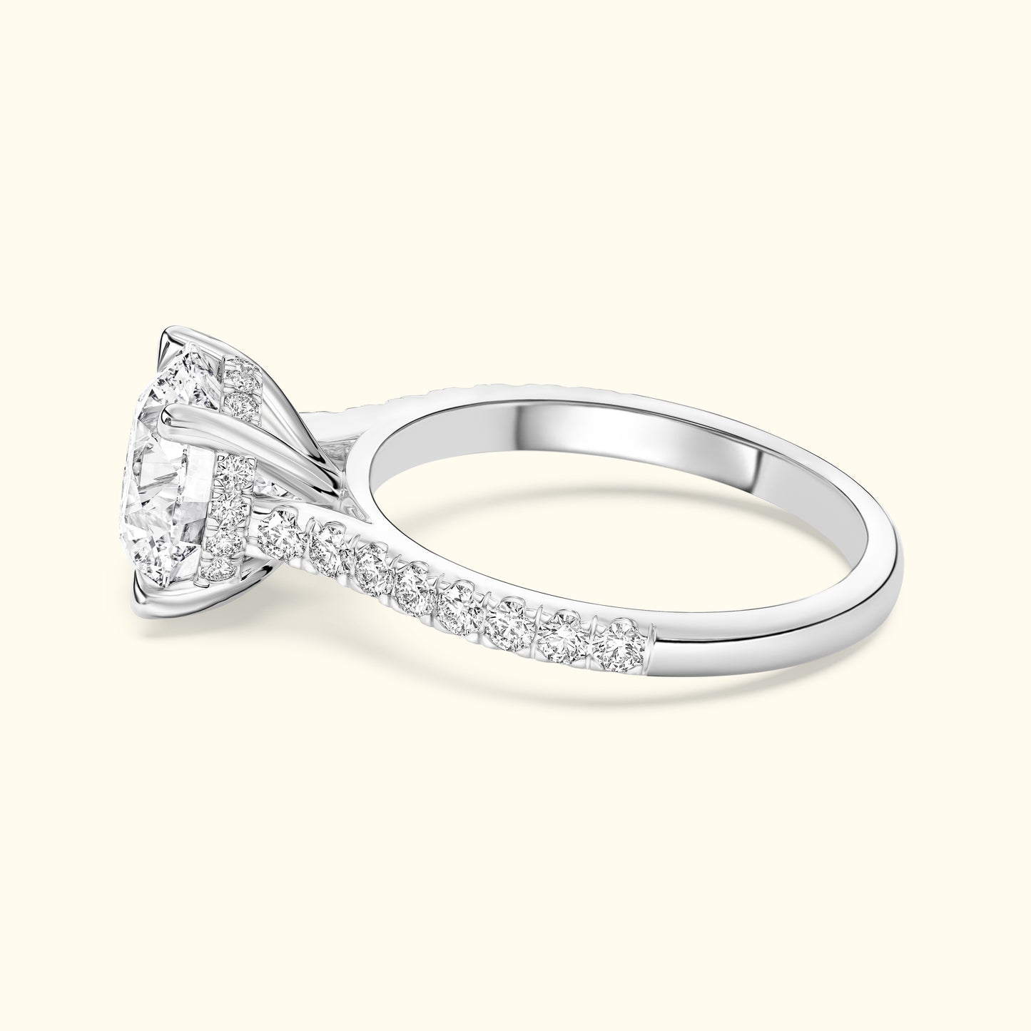 Elegant silver ring with a large diamond and smaller stones along the band.