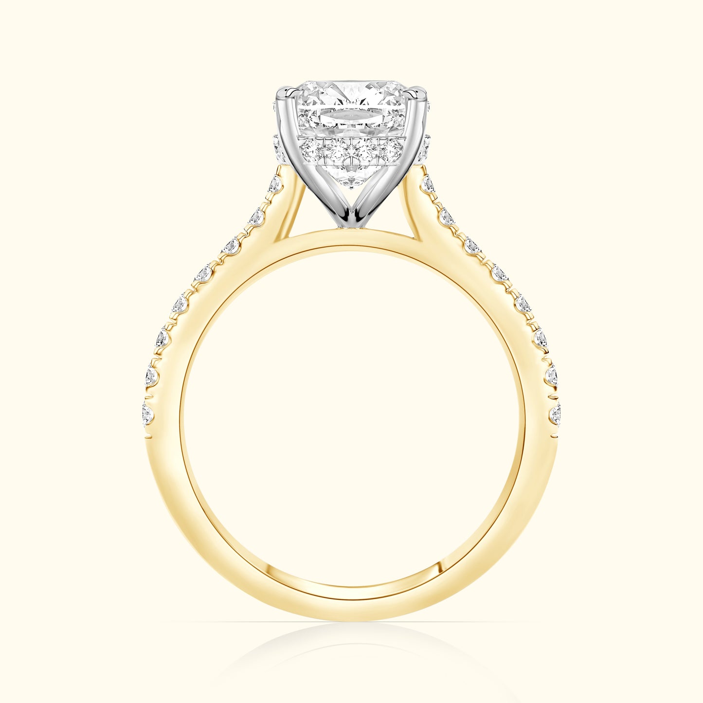 Solitaire diamond engagement ring with a yellow gold band and white gold setting.
