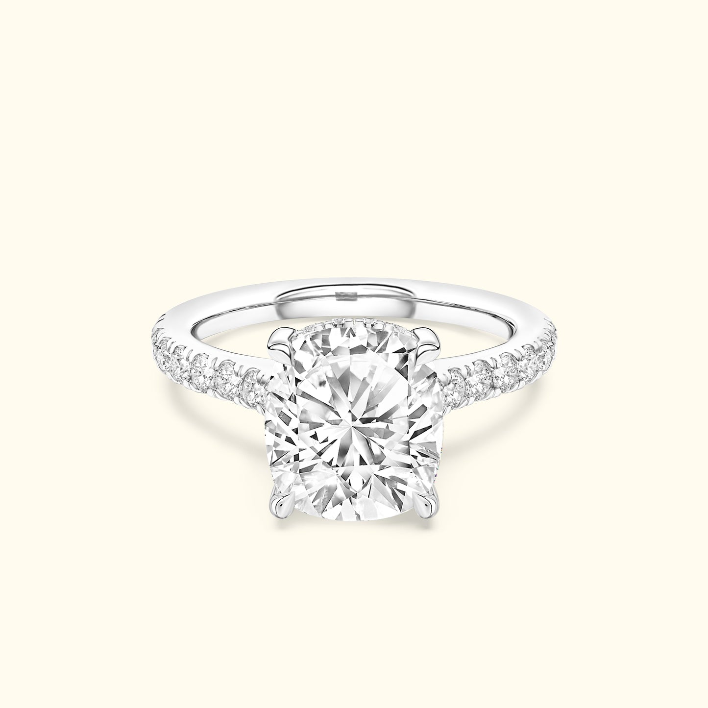 Solitaire diamond ring with a round center stone and diamond-accented band.