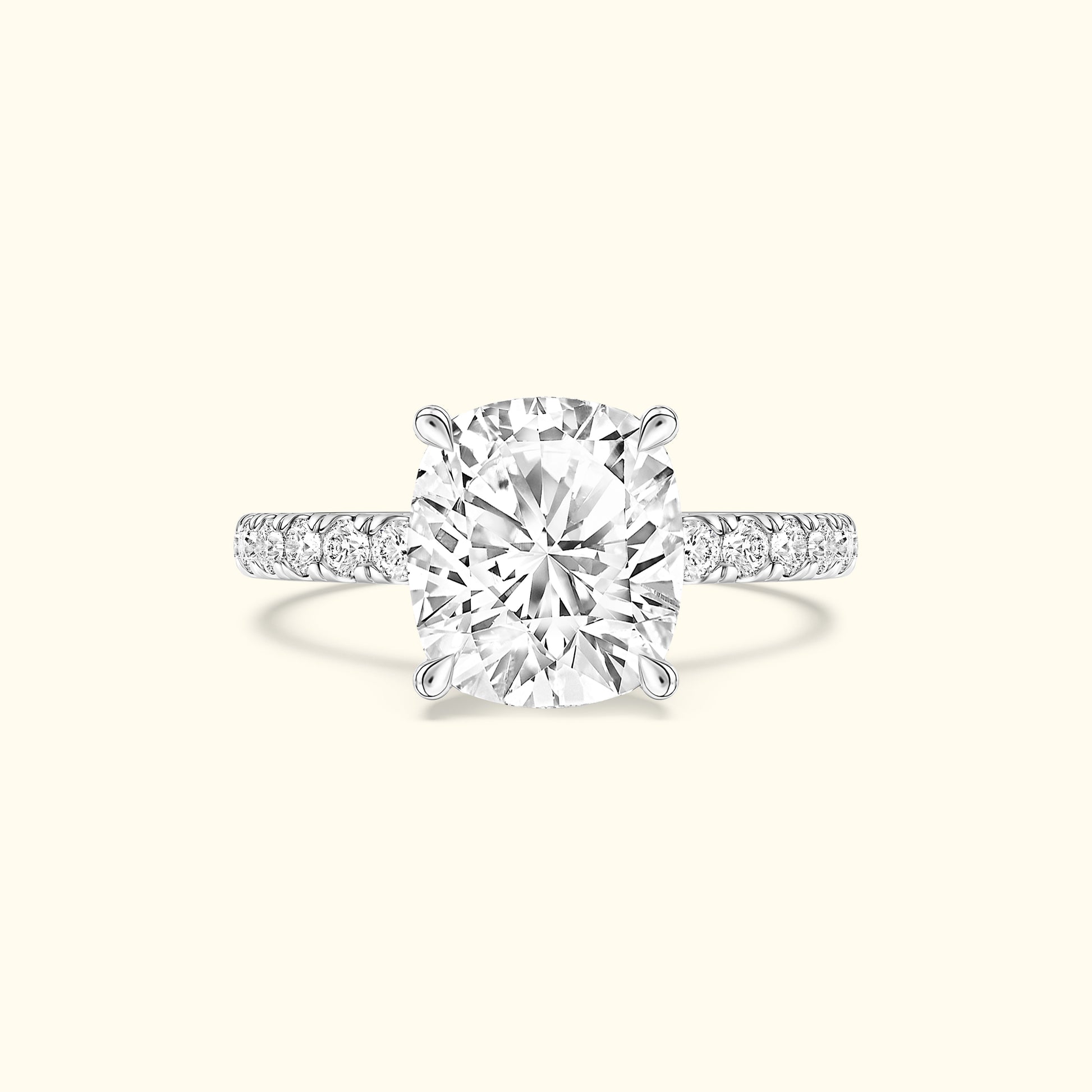 Elegant oval diamond ring set in white gold with a sparkling band.