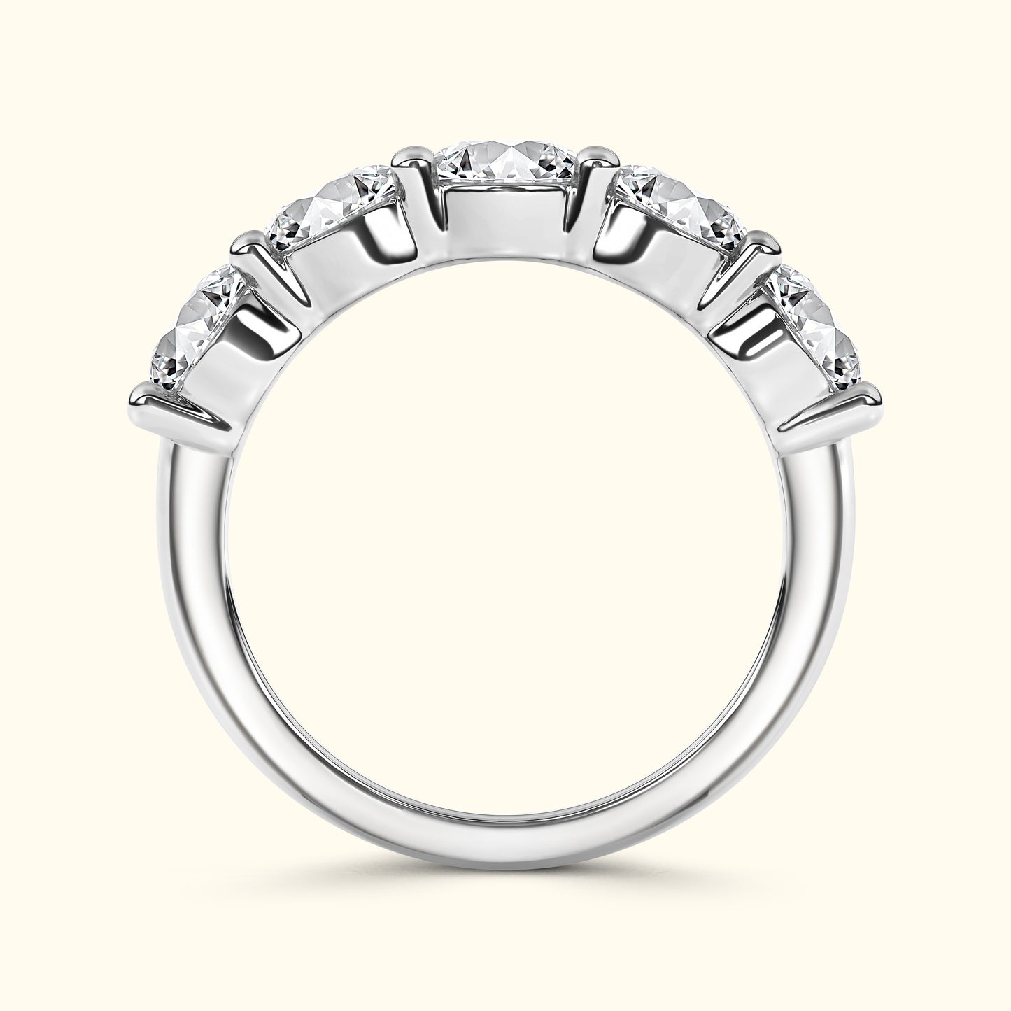 Silver band ring with five sparkling diamonds set in a curved alignment.