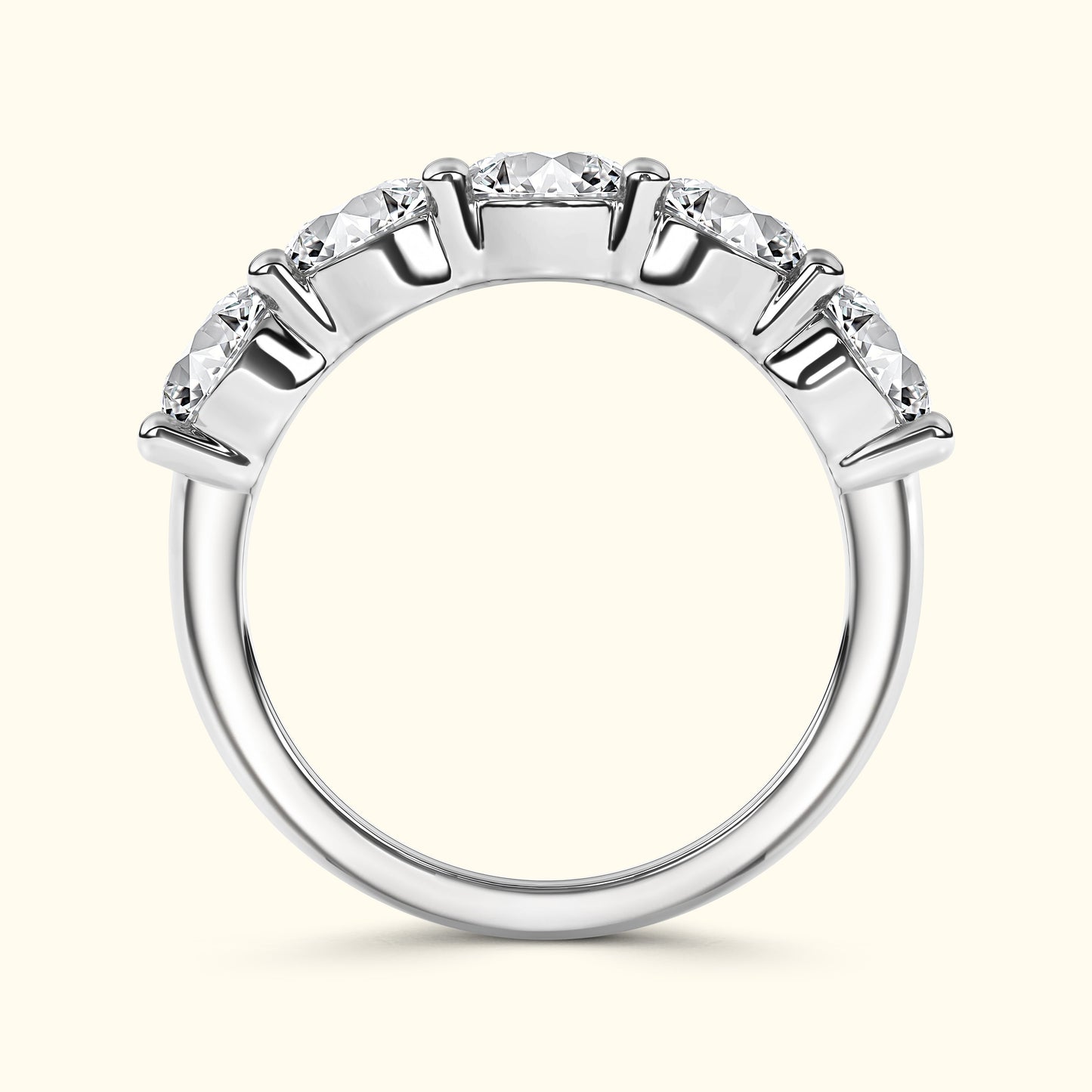 Silver band ring featuring five sparkling round diamonds.